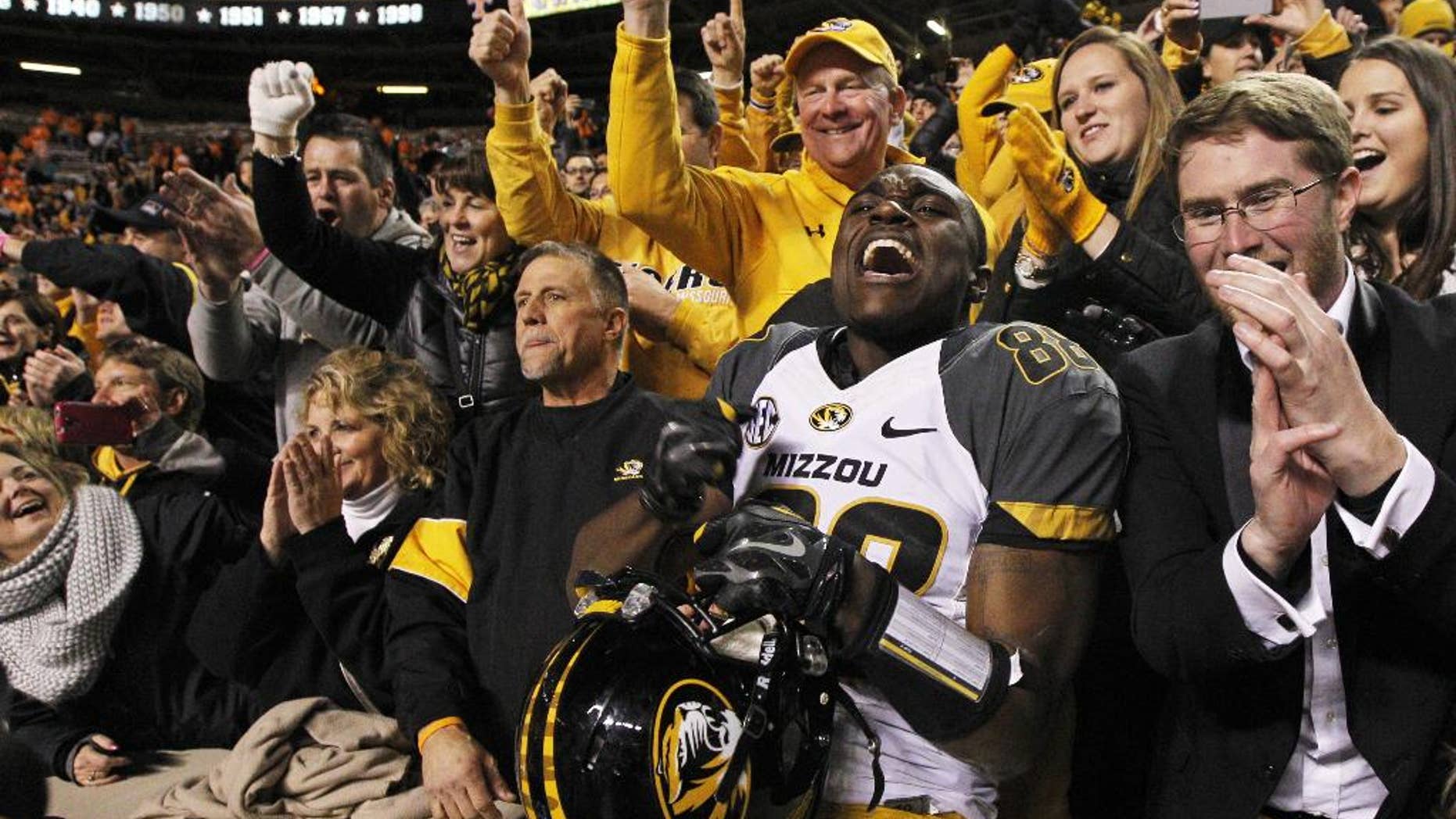 Missouri wide receiver Jimmie Hunt (88) celebrates with fans after an NCAA college football game against Tennessee on Saturday, Nov. 22, 2014, in Knoxville, Tenn. Missouri won 29-21. (AP Photo/Wade Payne)