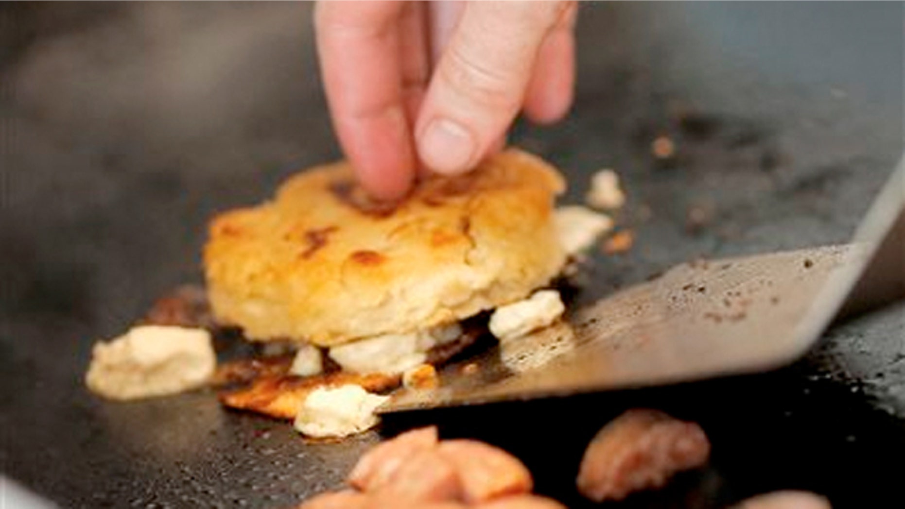 Nov. 6, 2013: A breakfast dish being cooked on the grill at the Welcome Diner in Phoenix.