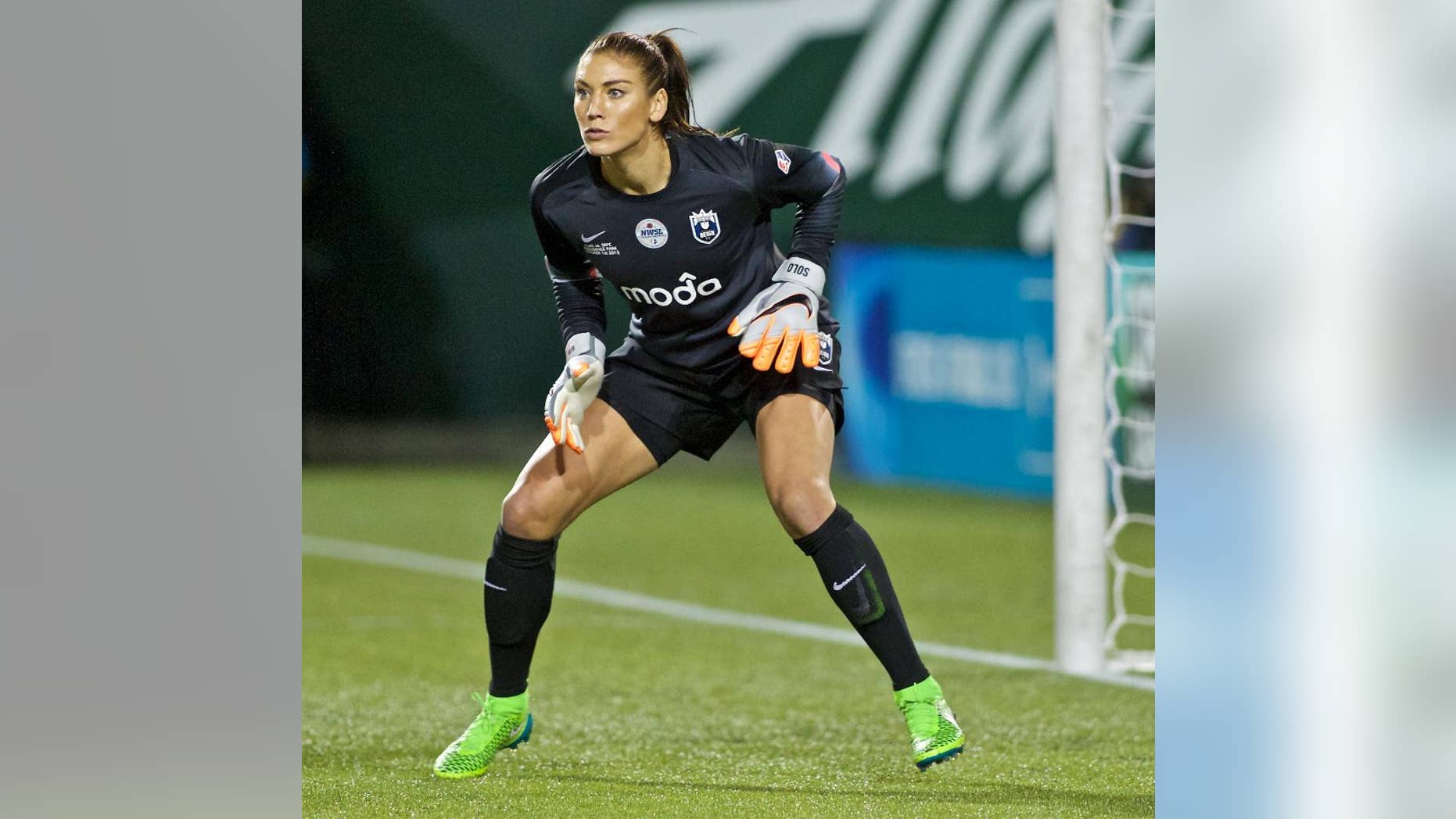 FILE - In this Oct. 1, 2015, file photo, Seattle Reign FC goalkeeper Hope Solo follows the action during the second half of the NWSL soccer championship match in Portland, Ore. Hope Solo says she hopes that someday she can return to the U.S. women's national team, but in the meantime she vows to keep fighting for equal pay for the players, Thursday, Dec. 22, 2016. (AP Photo/Craig Mitchelldyer, File)