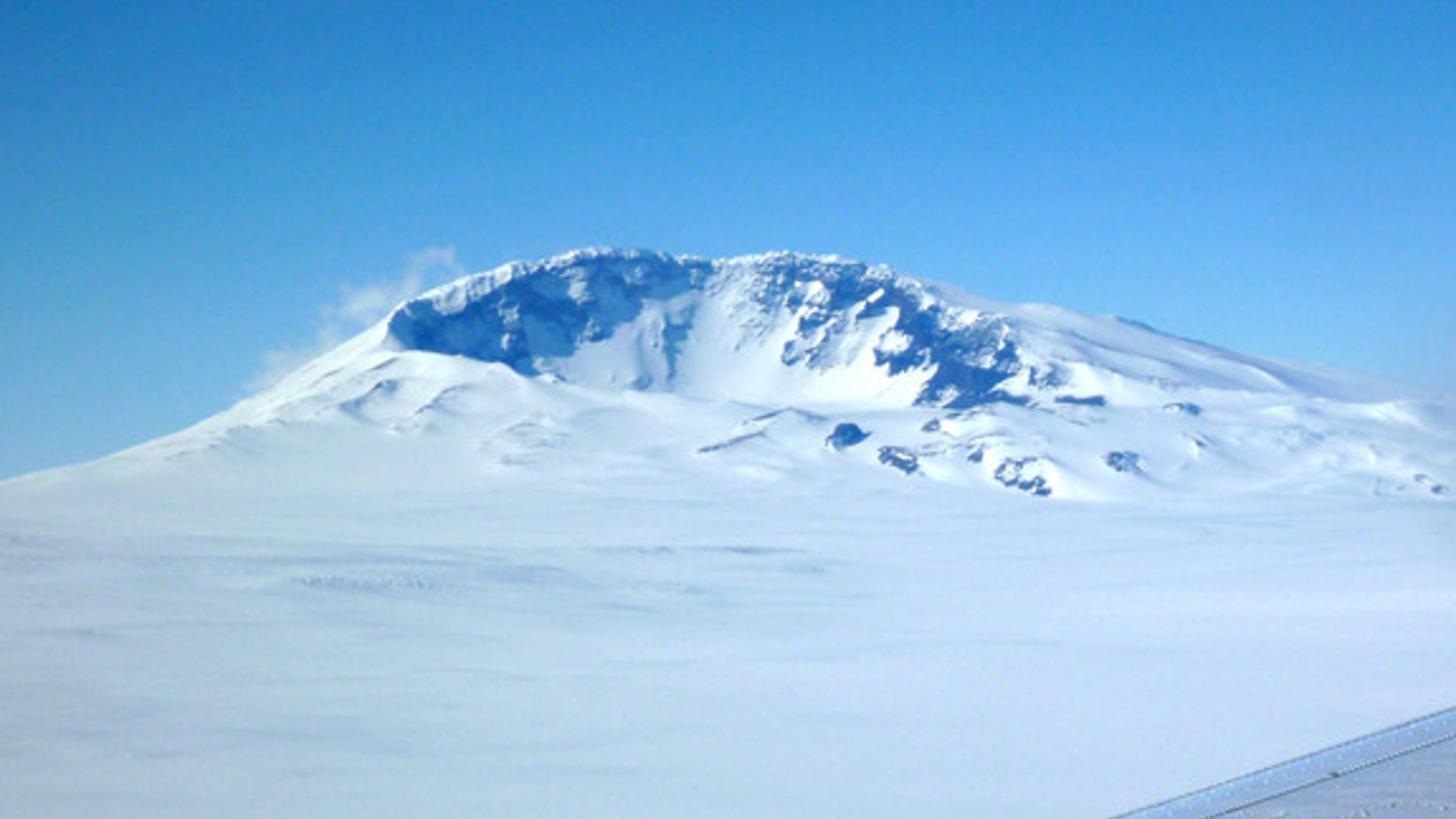 Mount Sidley is the youngest volcano rising above the ice in West Antarctica's Executive Committee Range. A group of seismologists has detected new volcanic activity under the ice about 30 miles ahead of Mount Sidley.
