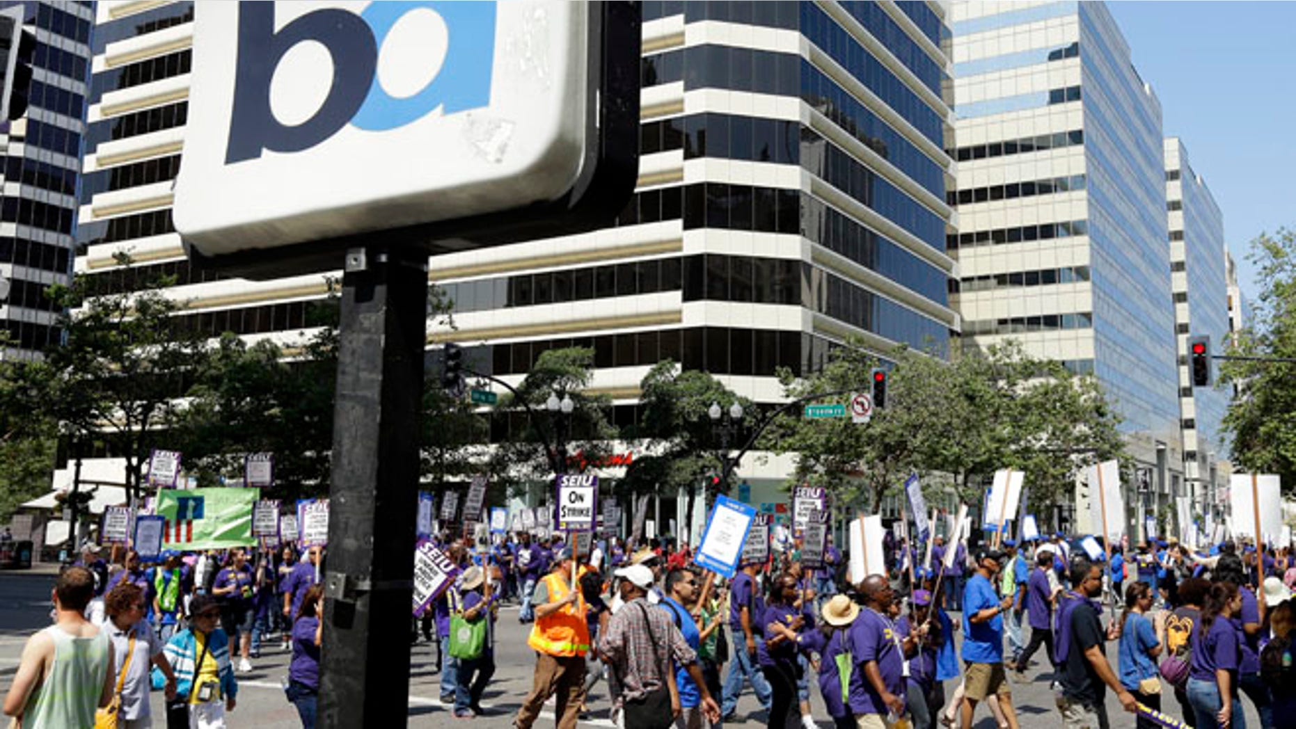 July 1, 2013: In this file photo, striking Bay Area Rapid Transit workers picket as they close the intersection of 14th & Broadway on Min downtown Oakland, Calif.