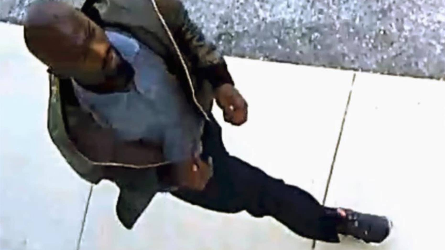 This undated photo from a surveillance video provided by the Houston Police Department shows a man that Houston police are labelling a person of interest in their investigation of the slaying of Josue Flores as he walked home from school May 17, 2016. Police Sgt. Tommy Ruland says detectives are looking for the public's help in identifying the man as they try to solve the stabbing death. (Houston Police Department via AP)