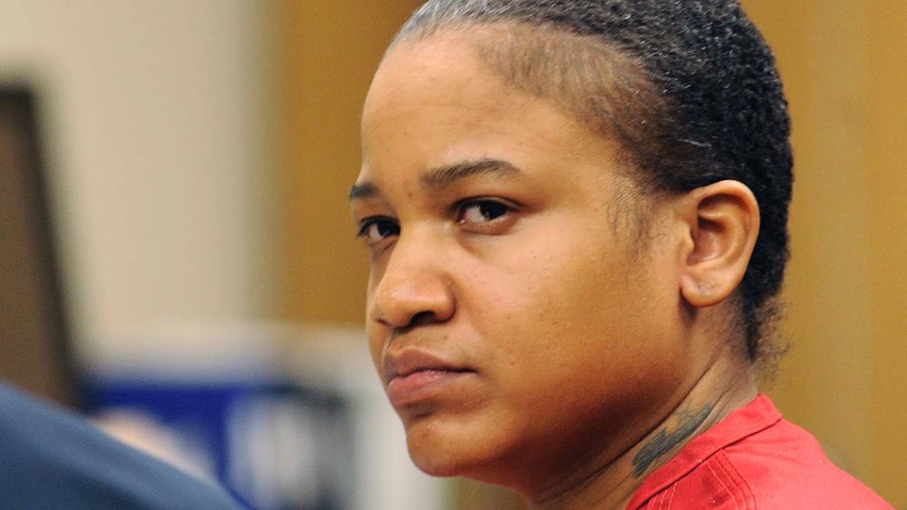 FILE - This June 4, 2015 file photo shows Mitchelle Blair during a custody hearing in Detroit. The Detroit woman, charged with first-degree murder, torture and child abuse, is accused of killing two of her children and storing their bodies in a freezer at her home. (Clarence Tabb Jr./Detroit News via AP, File) DETROIT FREE PRESS OUT; HUFFINGTON POST OUT
