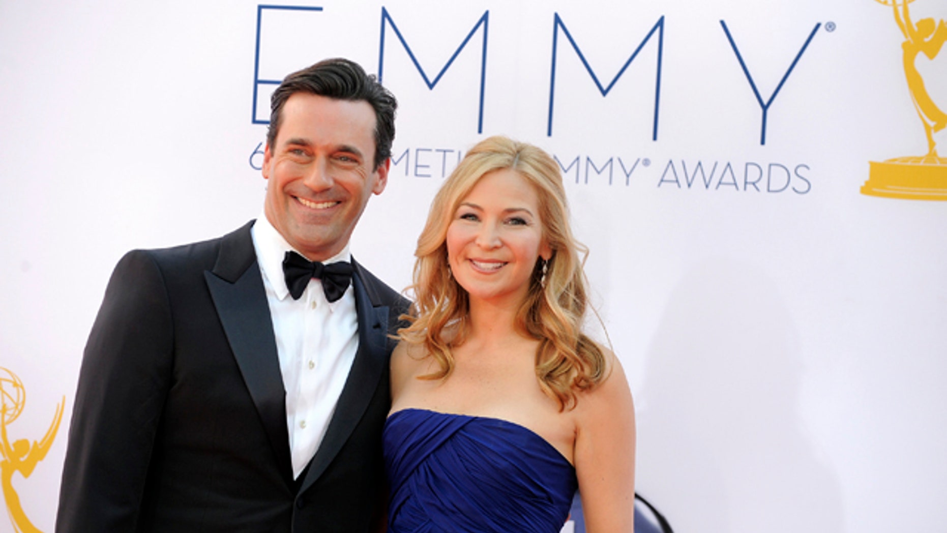 Sept. 23, 2012: Jon Hamm, left and Jennifer Westfeldt arrive at the 64th Primetime Emmy Awards at the Nokia Theatre in Los Angeles.