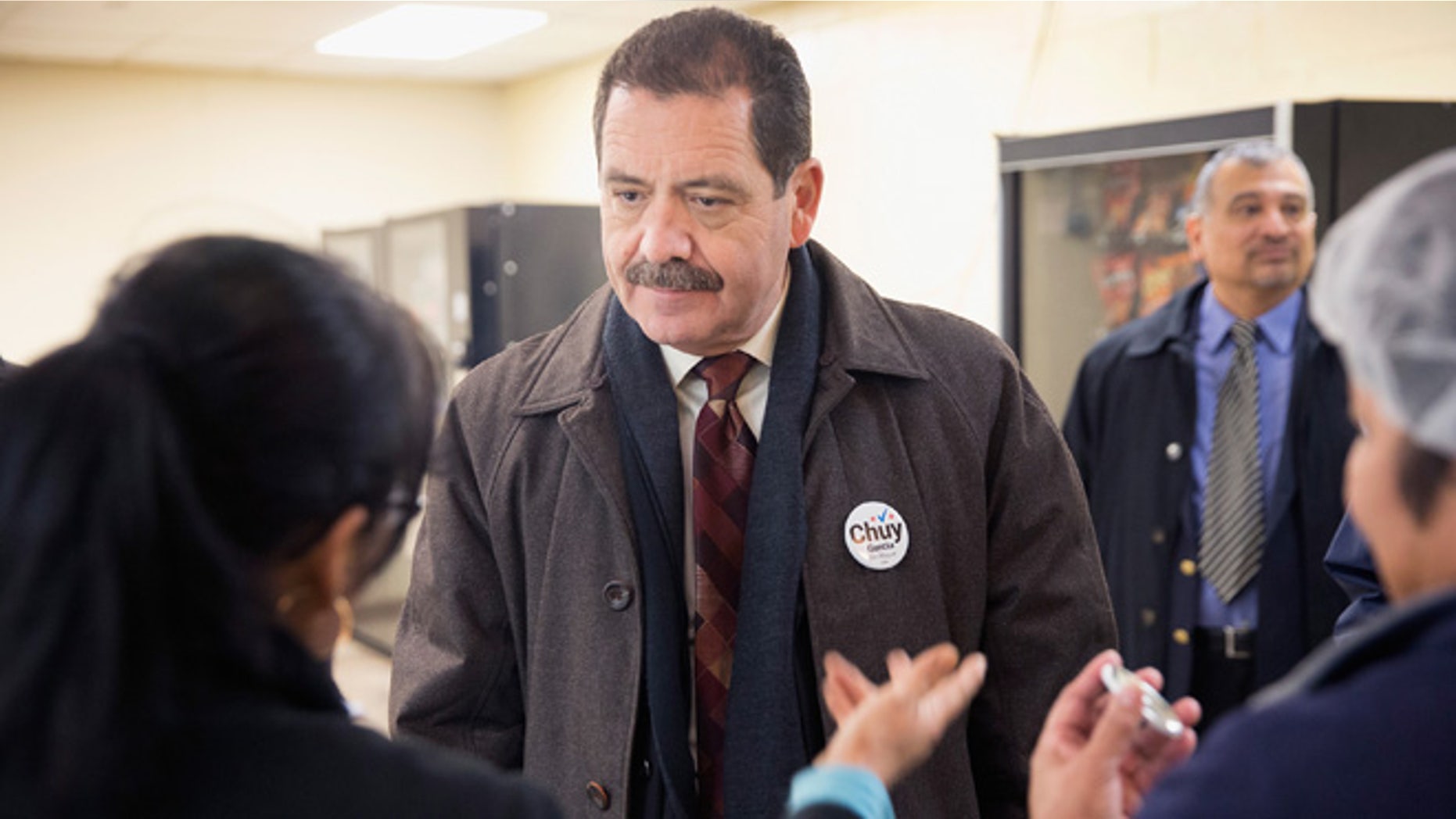 CHICAGO, IL - FEBRUARY 23: Chicago Mayoral candidate Jesus "Chuy" Garcia greets workers during a campaign stop at a linen and uniform service company on February 23, 2015 in Chicago, Illinois. Recent polls show Garcia is running second to incumbent Mayor Rahm Emanuel whose lead is not currently large enough to avoid a runoff election. Chicago residents go to the polls Tuesday, February 24. (Photo by Scott Olson/Getty Images)