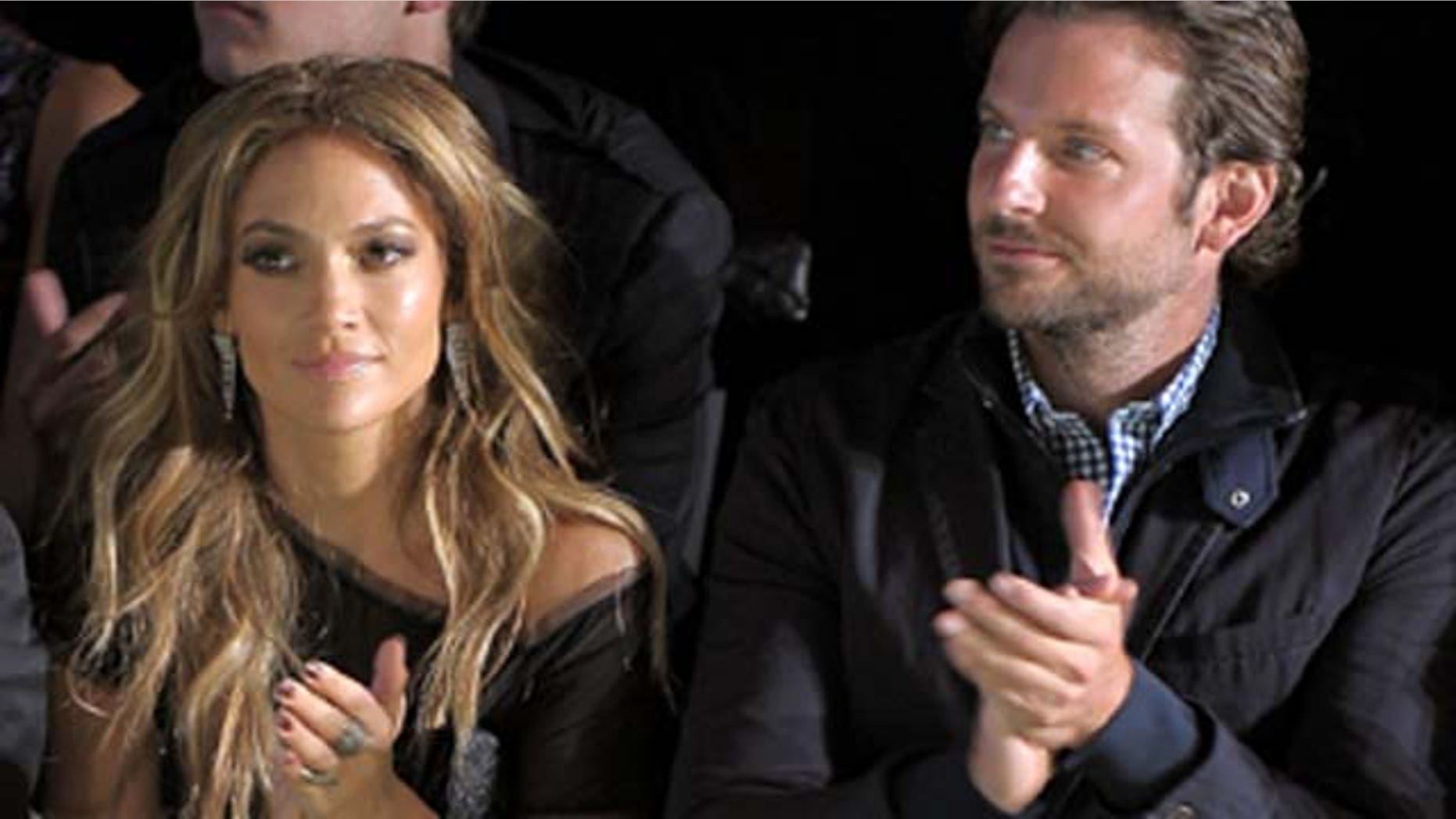 Sept. 12, 2010: Singer/actress Jennifer Lopez and actor Bradley Cooper attend the Tommy Hilfiger Spring 2011 fashion show during Mercedes-Benz Fashion Week at The Theater at Lincoln Center in New York City.