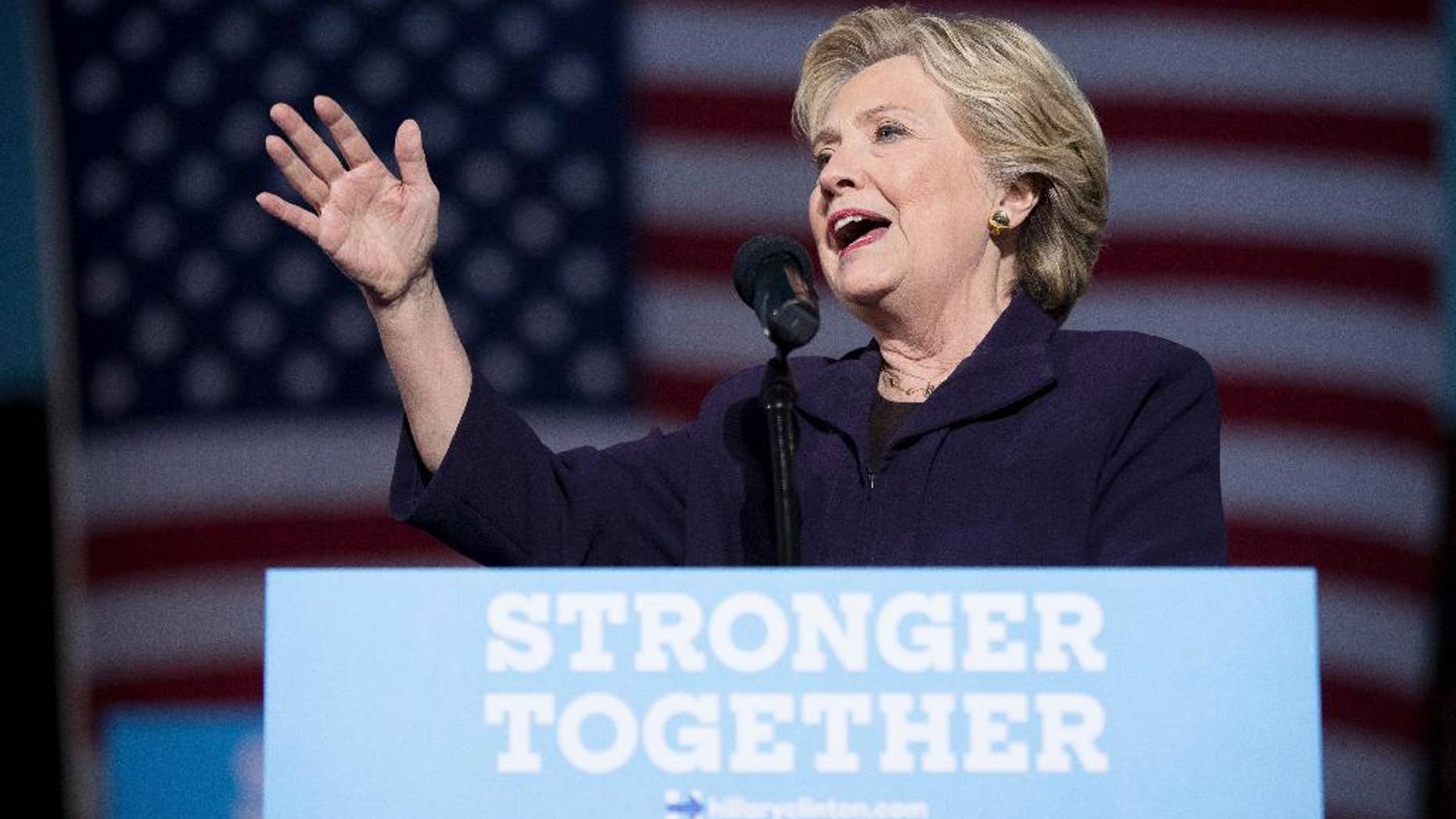 Democratic presidential candidate Hillary Clinton speaks at a rally at The Ohio State University in Columbus, Ohio, Monday, Oct. 10, 2016. (AP Photo/Andrew Harnik)