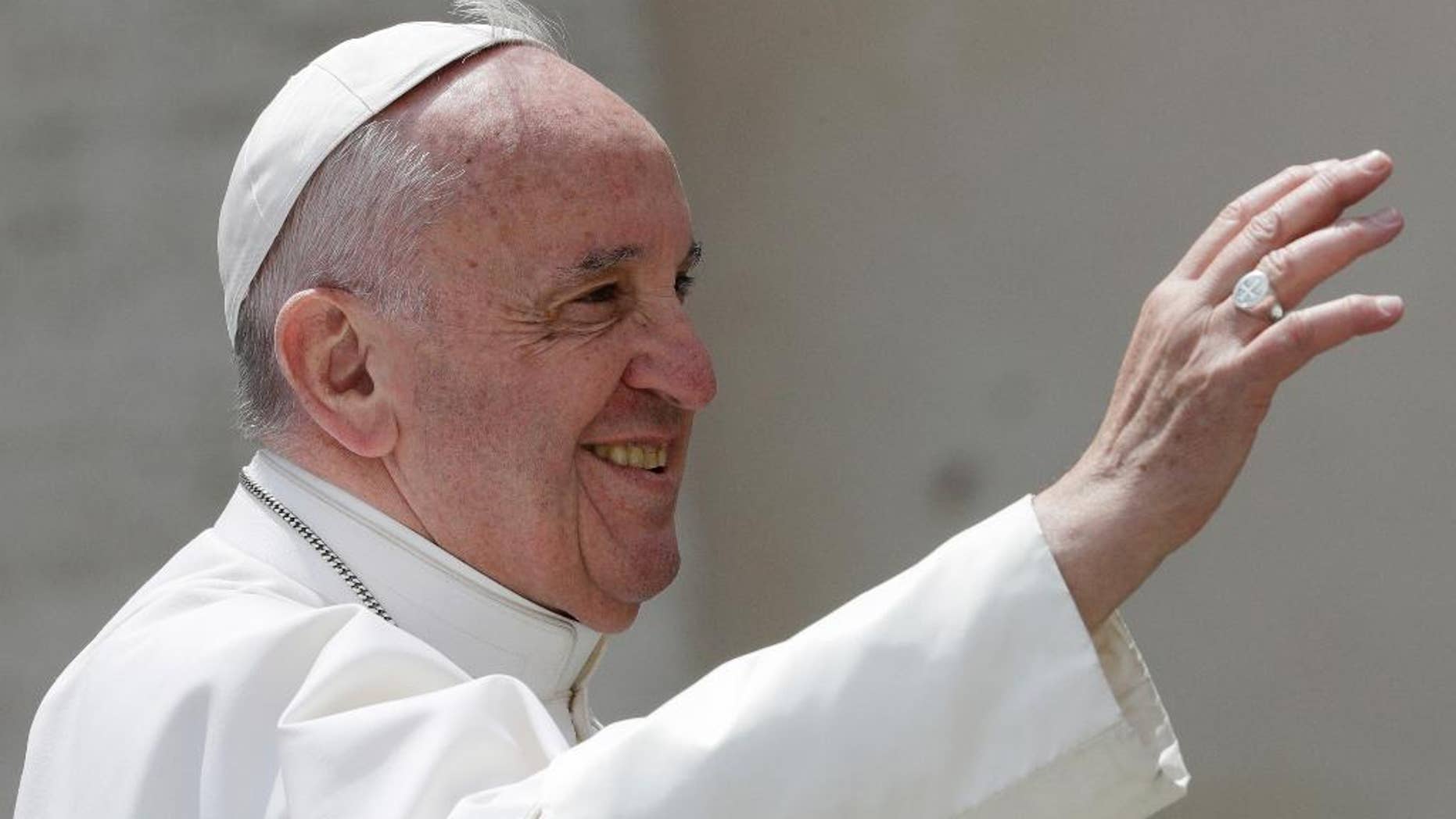 Pope Francis salutes at the end of his weekly general audience in St. Peter square at the Vatican, Wednesday, April 26, 2017. (AP Photo/Andrew Medichini)