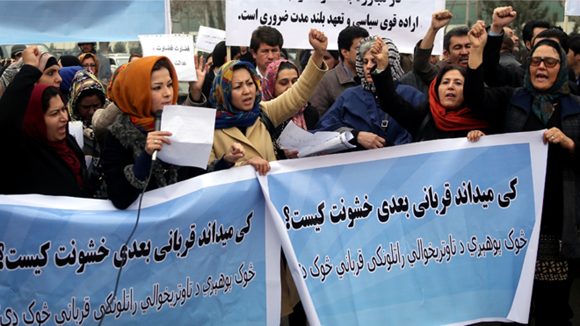 Feb. 23, 2015: Afghanistan civil society activists participate in a demonstration to protest the increasing violence against women in their country, in front of the High Court in Kabul, Afghanistan. Writing on the posters reads: "Who knows who will be the next victim of violence?," "We want the rapists to receive punishment," and "to fight against violence we need a strong decision."
