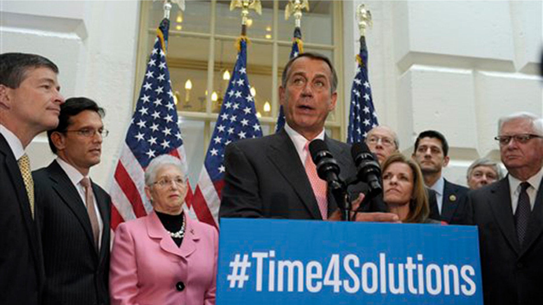 FILE -- Oct. 10, 2013: House Speaker John Boehner of Ohio, accompanied by fellow House Republicans, speaks during a news conference on Capitol Hill in Washington following a meeting. From left are, Rep. Jeb Hensarling, (R-Texas), House Majority Leader Eric Cantor of Va., Rep. Virginia Foxx, (R-N.C.), Boehner, Rep. Greg Walden, (R-Ore.), Rep. Lynn Jenkins, (R-Kansas), Rep. Paul Ryan,(R-Wis.), Rep. Fred Upton, (R-Mich.), and Rep. Harold Rogers, (R-Ky).
