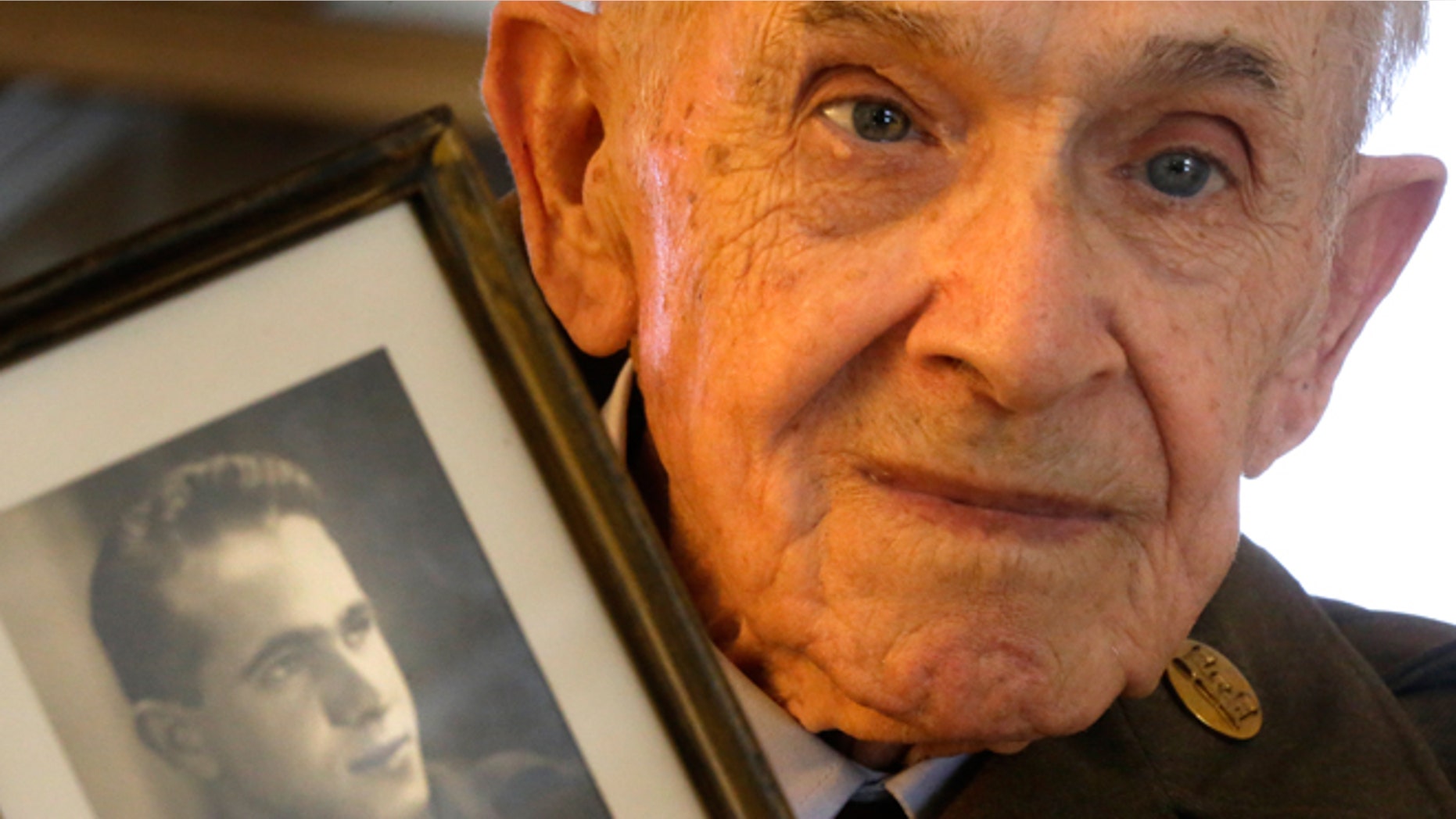 June 4, 2014: Eighty-nine-year-old Roland Chaisson, who stormed Normandy on D-Day when Germans killed half his squad before they could reach shore, poses for photographs in his home in Metairie, La. Chaisson is among D-Day veterans who will describe that day Friday and Saturday at the National World War II Museum.