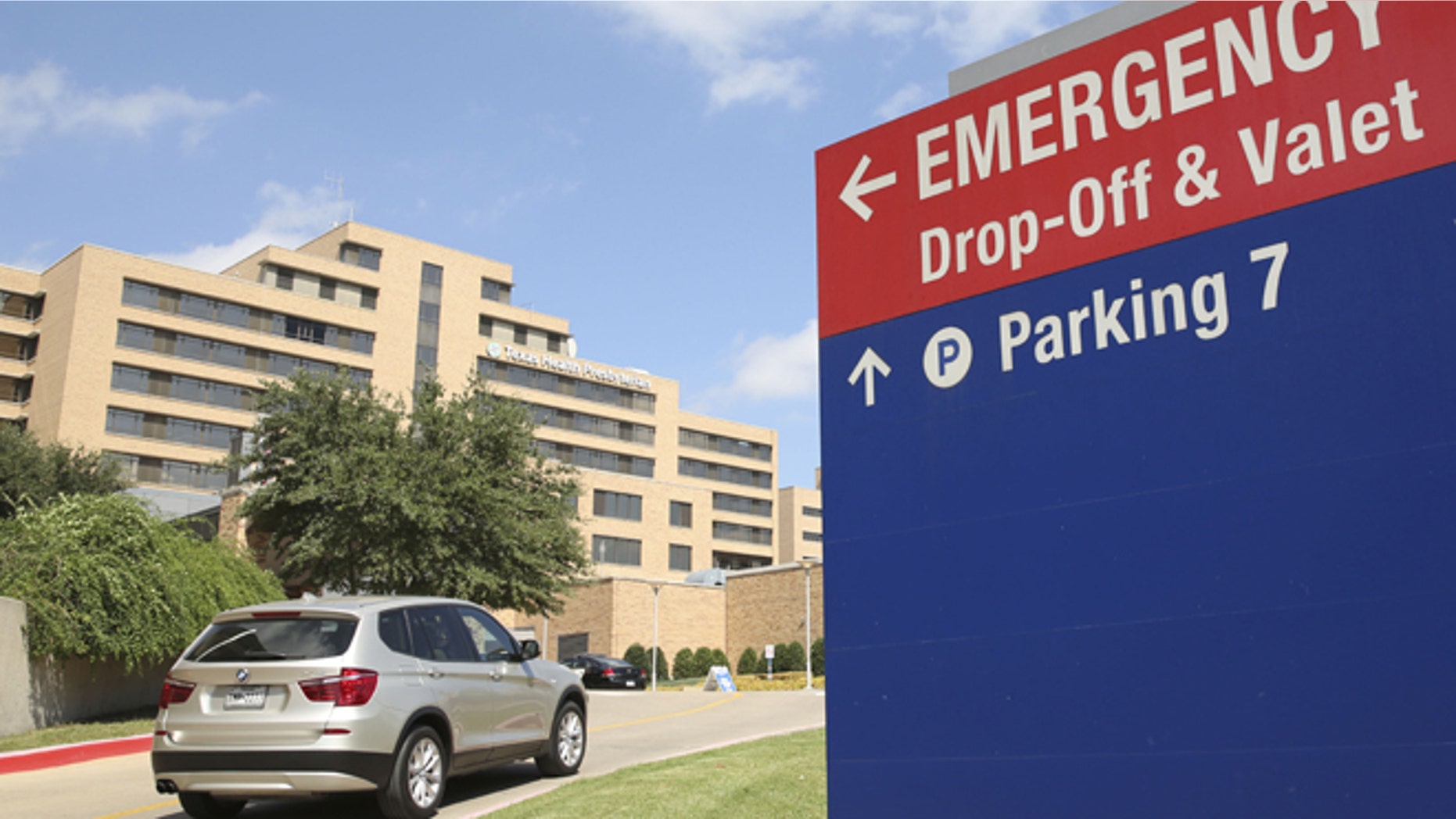 Sept. 30, 2014: A vehicle drives up the driveway to the Texas Health Presbyterian Hospital in Dallas. A patient in the hospital is being teated for Ebola.