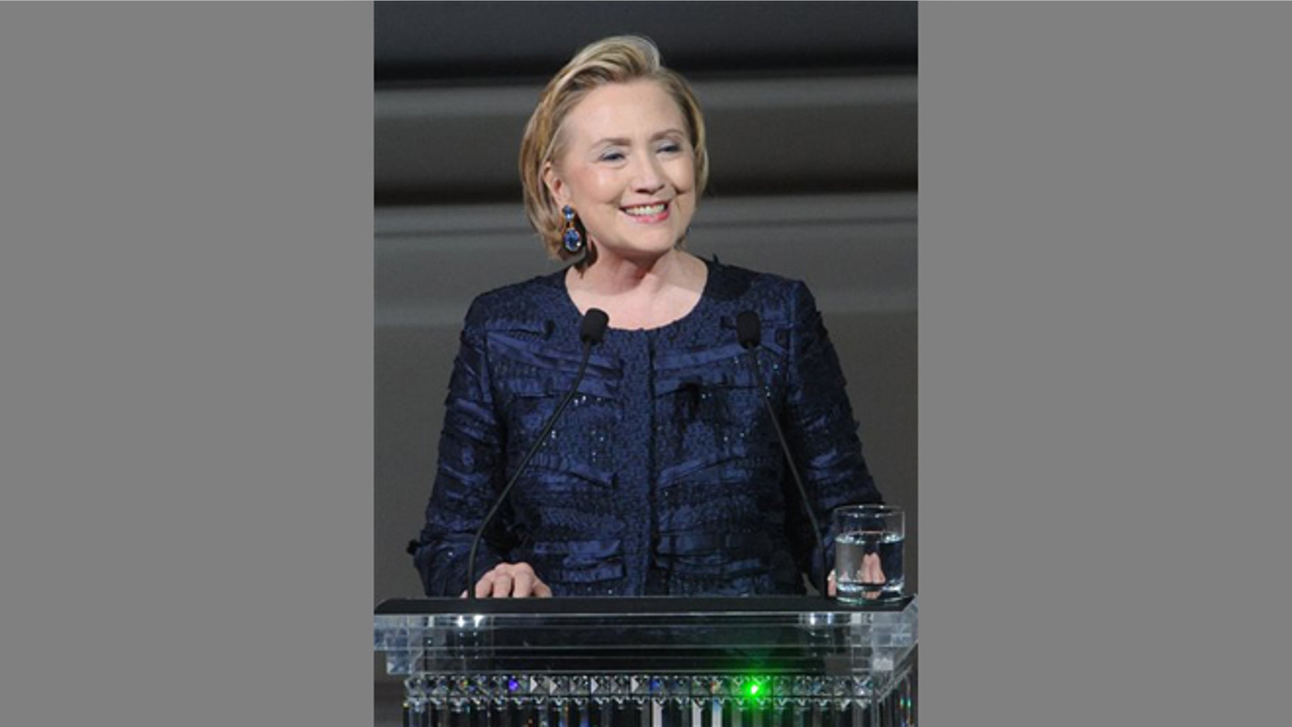 FILE -- June 3, 2013: Former Secretary of State Hillary Rodham Clinton speaks on stage during the 2013 CFDA Fashion Awards at Alice Tully Hall in New York.