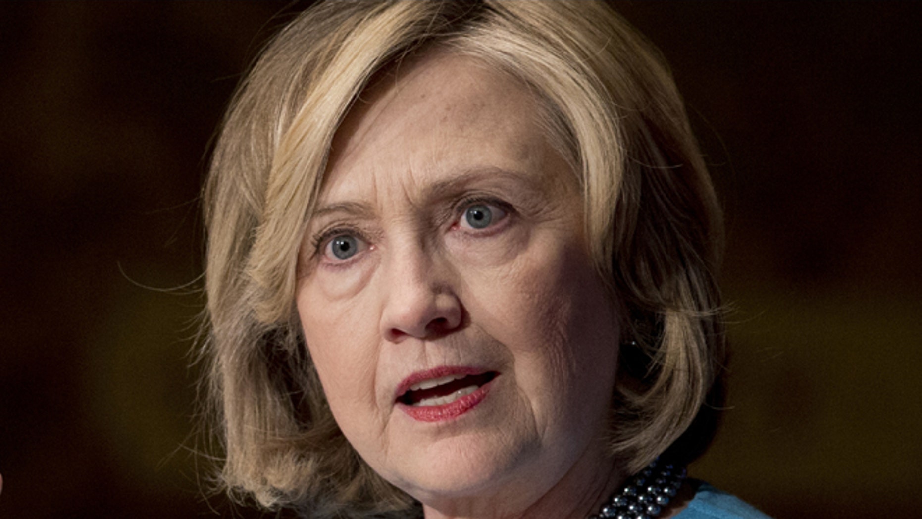 FILE - Dec. 3, 2014: Former Secretary of State Hillary Rodham Clinton speaks in Gaston Hall at Georgetown University, in Washington.
