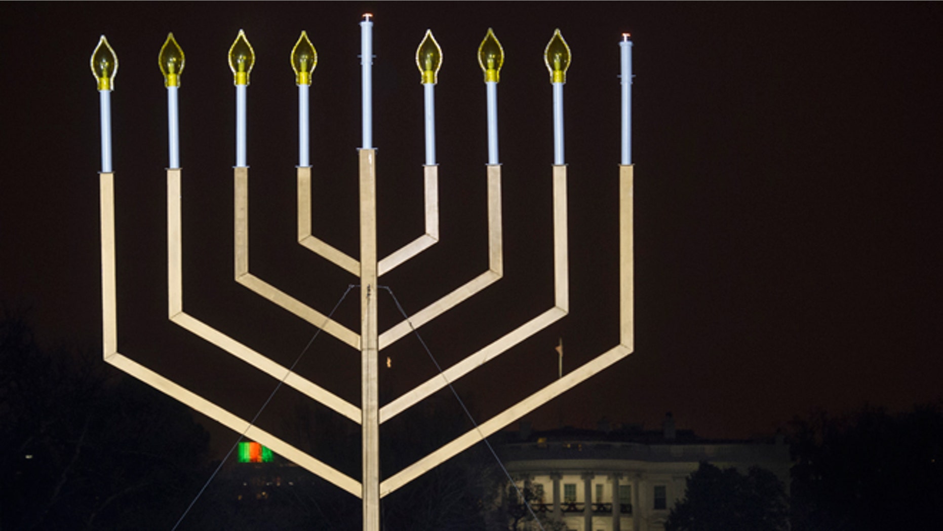 Dec. 16, 2014: The White House is in the background after the national menorah was lit during a ceremony marking the start of the celebration of Hanukkah, on the Ellipse near the White House in Washington.