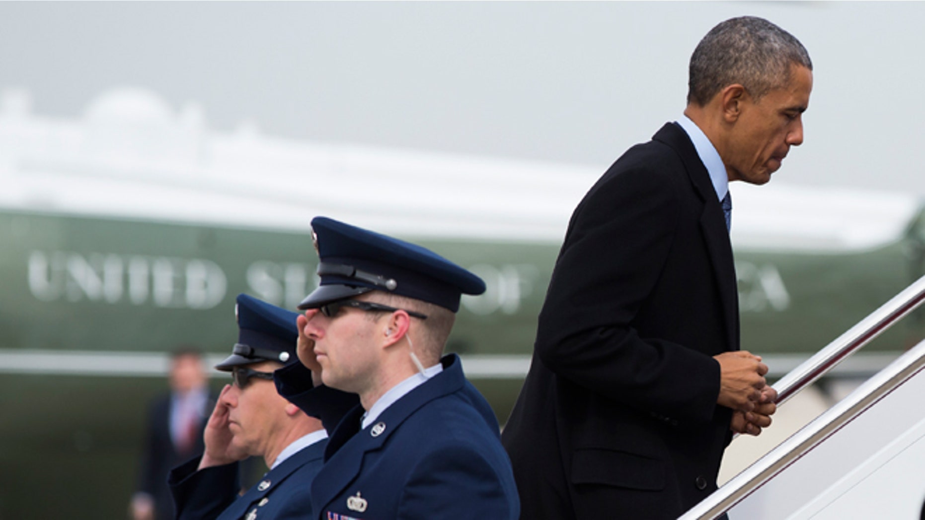 Feb. 25, 2015: President Obama boards Air Force One at Andrews Air Force base, Md., for a trip to Miami.