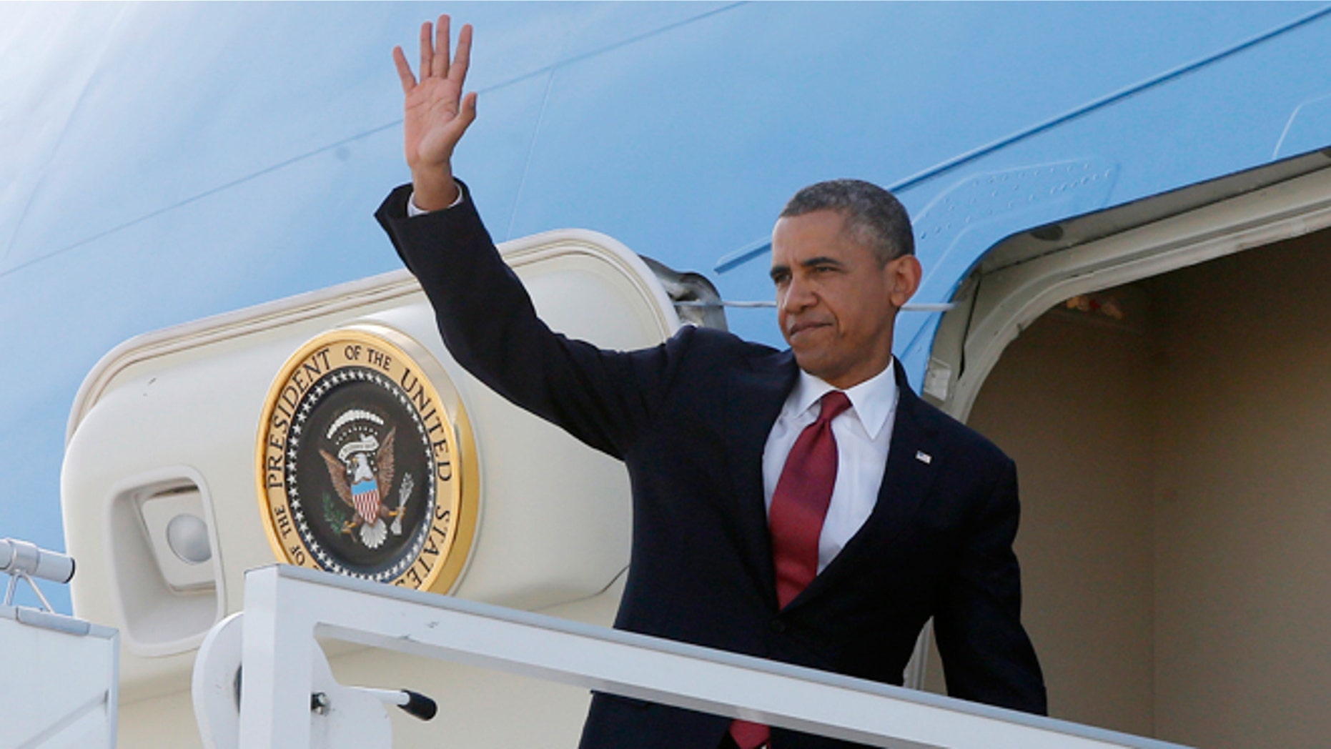June 6, 2014: President Obama boards Air Force One at Orly Airport in Paris after attending the celebrations of the 70th anniversary of D-Day at Sword Beach in Ouistreham, France.