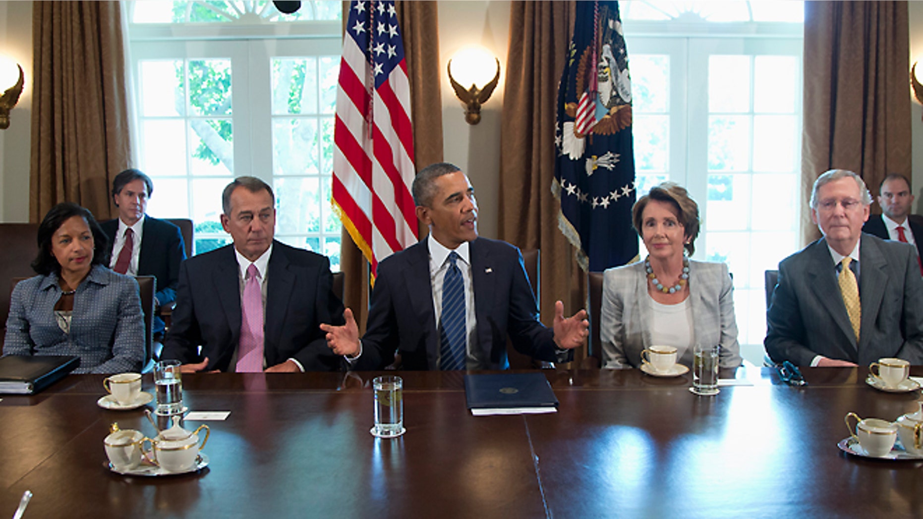 Sept. 3, 2013: President Obama speaks to media in the Cabinet Room of the White House in Washington before a meeting with Congressional leaders to discuss the situation in Syria. From left are, National Security Adviser Susan Rice, House Speaker John Boehner of Ohio, the president, House Minority Leader Nancy Pelosi of Calif., and Senate Minority Leader Mitch McConnell of Ky.