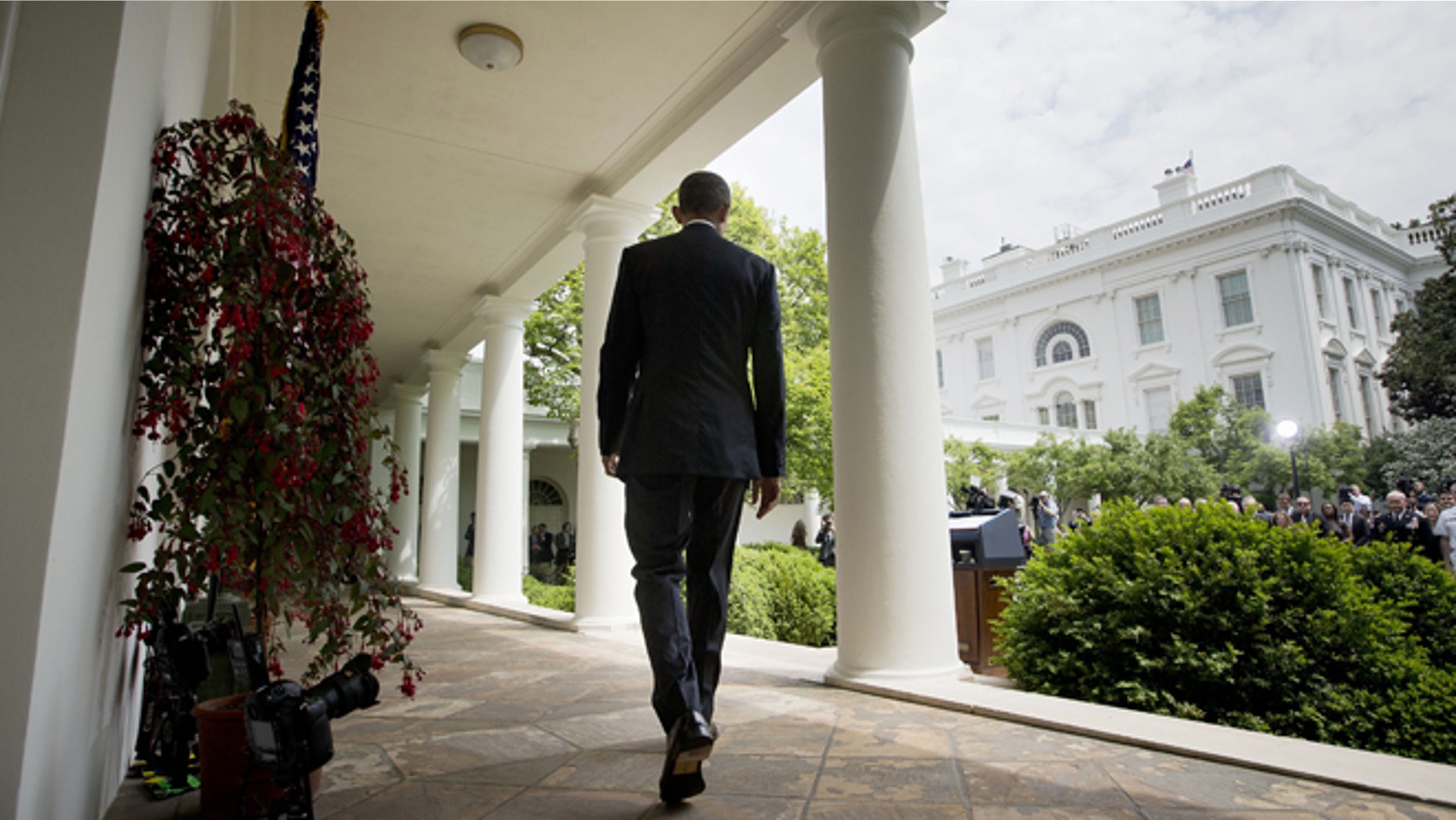 May 5, 2015: President Obama walks to the Rose Garden of the White House in Washington.