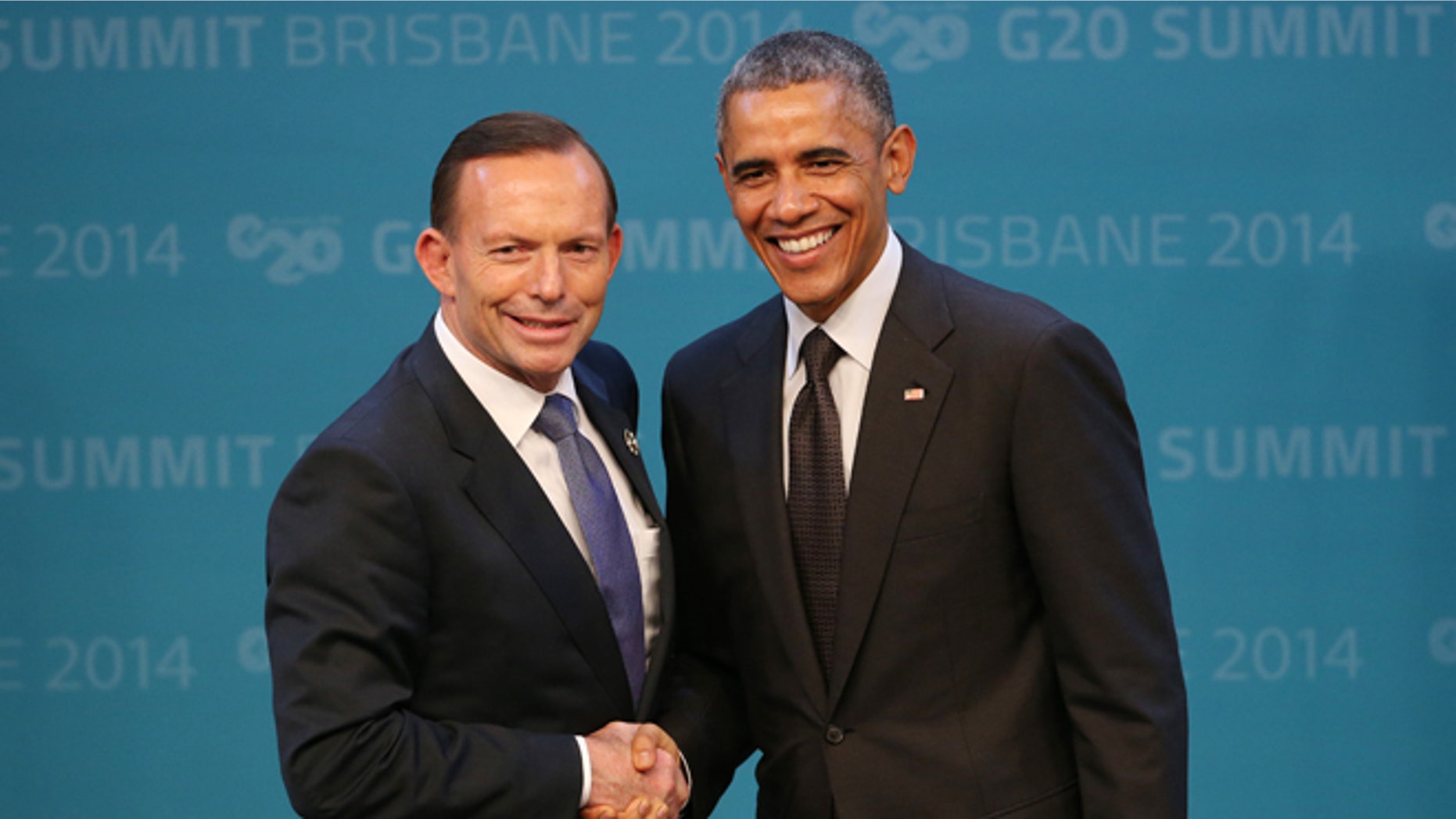 Nov. 15, 2014: Prime Minister of Australia Tony Abbott welcomes President Obama to the G-20 summit in Brisbane, Australia.