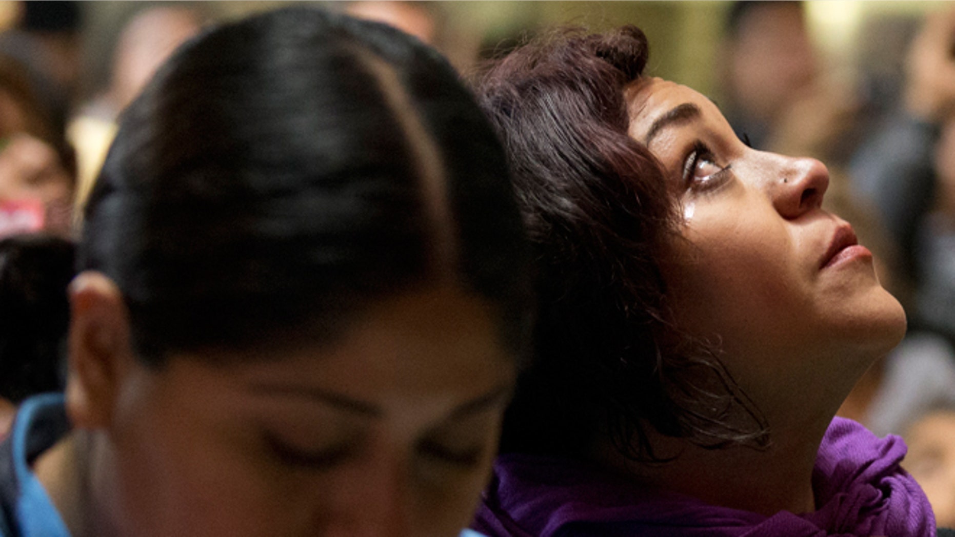 Dec. 12, 2014: A tear runs from the eye of a pilgrim as she looks up at the apron of Juan Diego, a 16th century relic believed to hold the imprint of the Virgin of Guadalupe, in Mexico City. Every year hundreds of thousands of people from across the country, many carrying images or statues of Mexico's patron saint to be blessed, converge at the Basilica on Dec. 12, the Virgin's feast day. Pilgrims are able to view the apron from moving walkways that pass below.