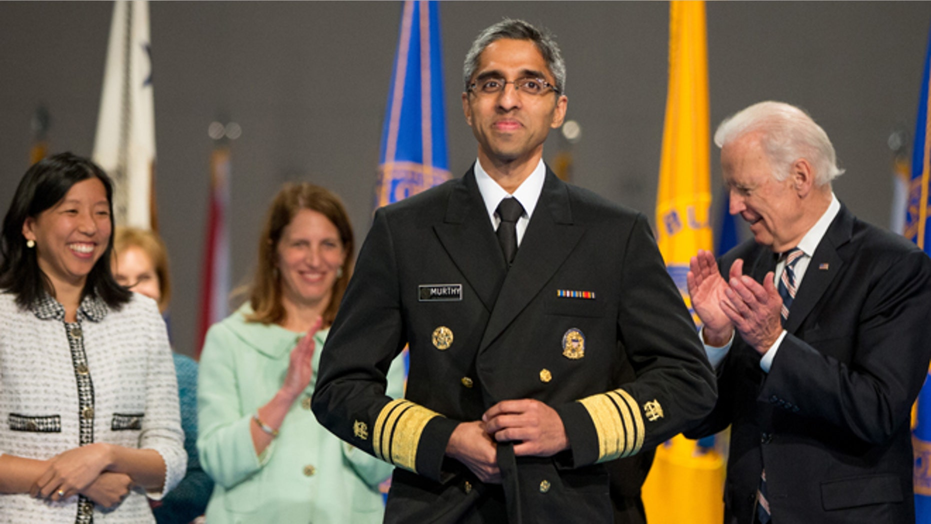 April 22, 2015: Alice Chen, left, Health and Human Services Secretary Sylvia Burwell, second from left, and Vice President Joe Biden, right, stand with U.S. Surgeon General Vivek Murthy, center, after he is ceremonially sworn-in in Conmy Hall at Fort Myer in Arlington, Va. Chen is the fiancé of Murthy.