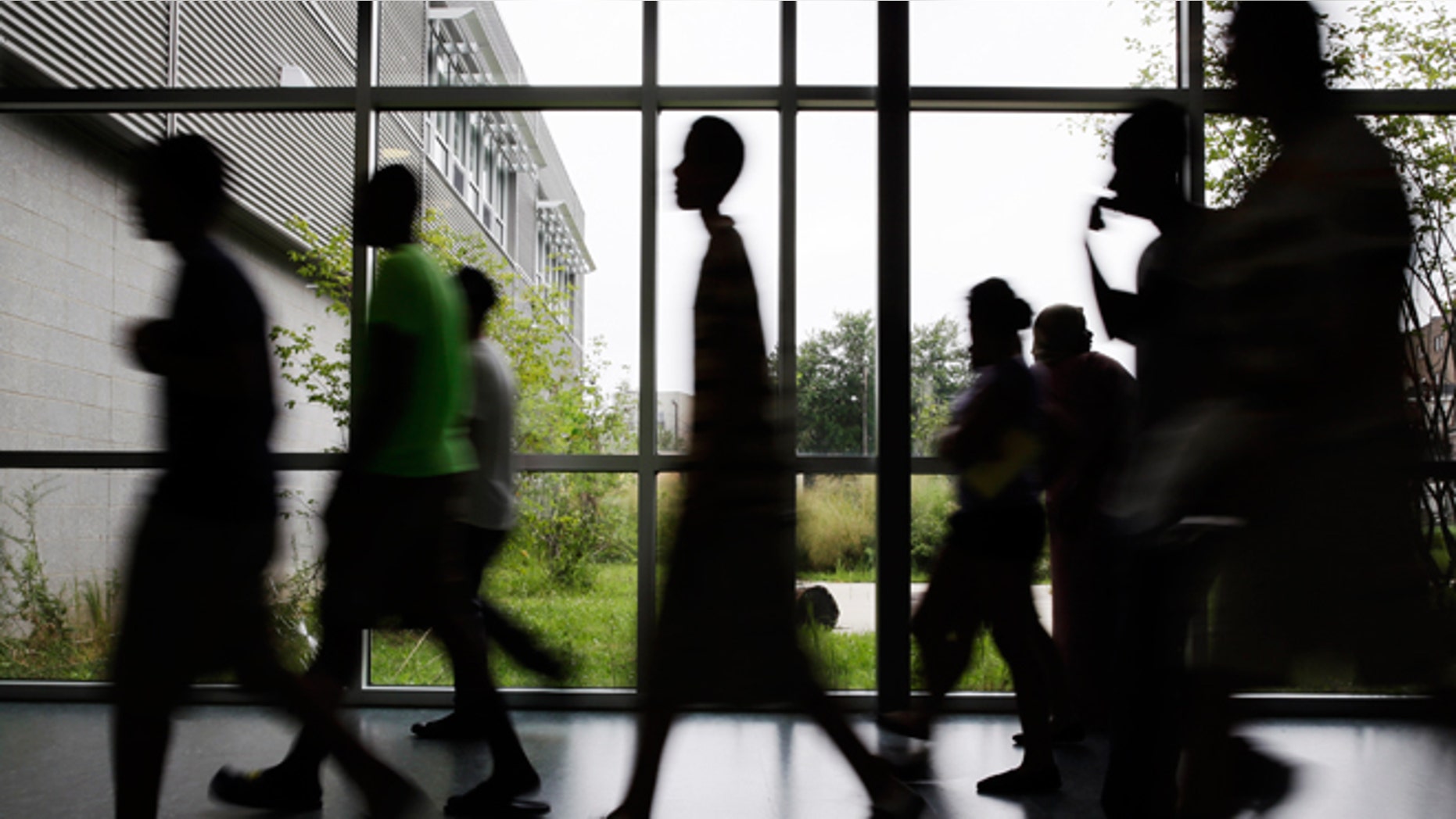Aug. 29, 2013: Students walk the halls during an open house for incoming freshman and transfer students at Kensington High School for the Creative and Performing Arts in Philadelphia.