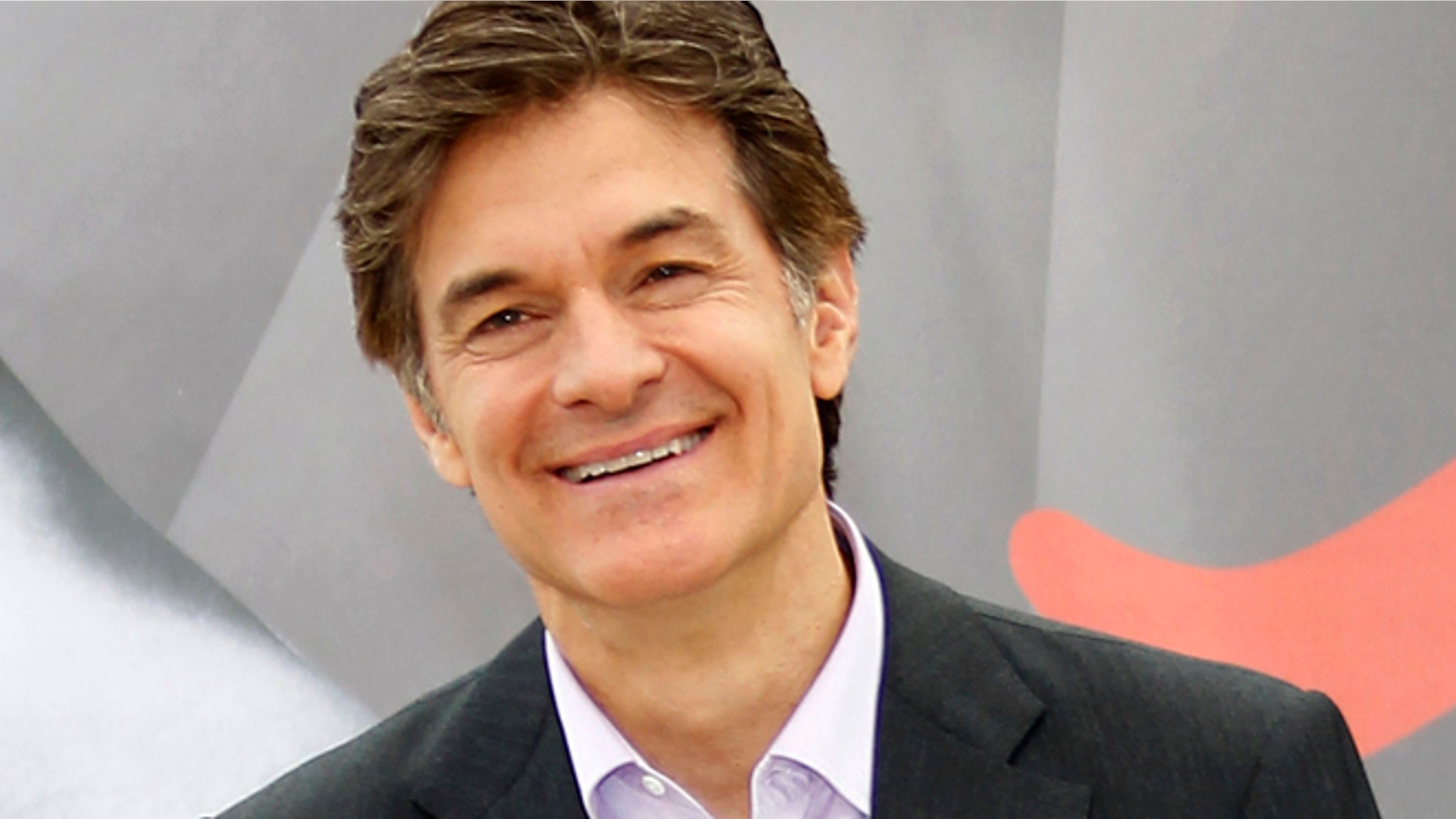 Health expert Mehmet Oz poses during a photocall for the TV series "The Dr Oz Show" at the 52nd Monte Carlo Television Festival in Monaco June 13, 2012. REUTERS/Eric Gaillard (MONACO - Tags: ENTERTAINMENT HEALTH) - RTR33J6A