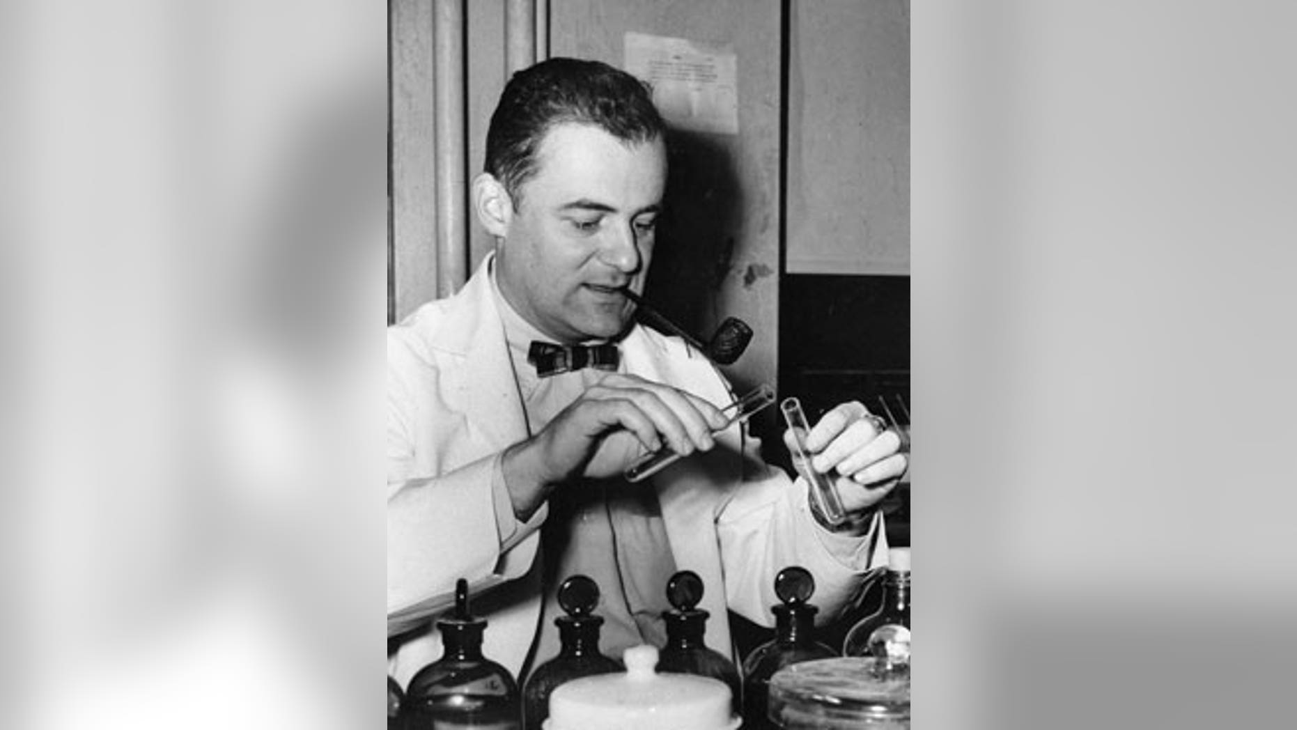 This Oct. 21, 1954 file photo shows Dr. Frederick C. Robbins, new chief of pediatrics and contagious diseases at Cleveland City Hospital, after the announcement that he, Dr. John Enders and Dr. Thomas Weller were awarded the Nobel prize for medicine. The 1954 Nobel Prize in medicine was awarded for work with fetal tissue that led to developing a vaccine against polio.