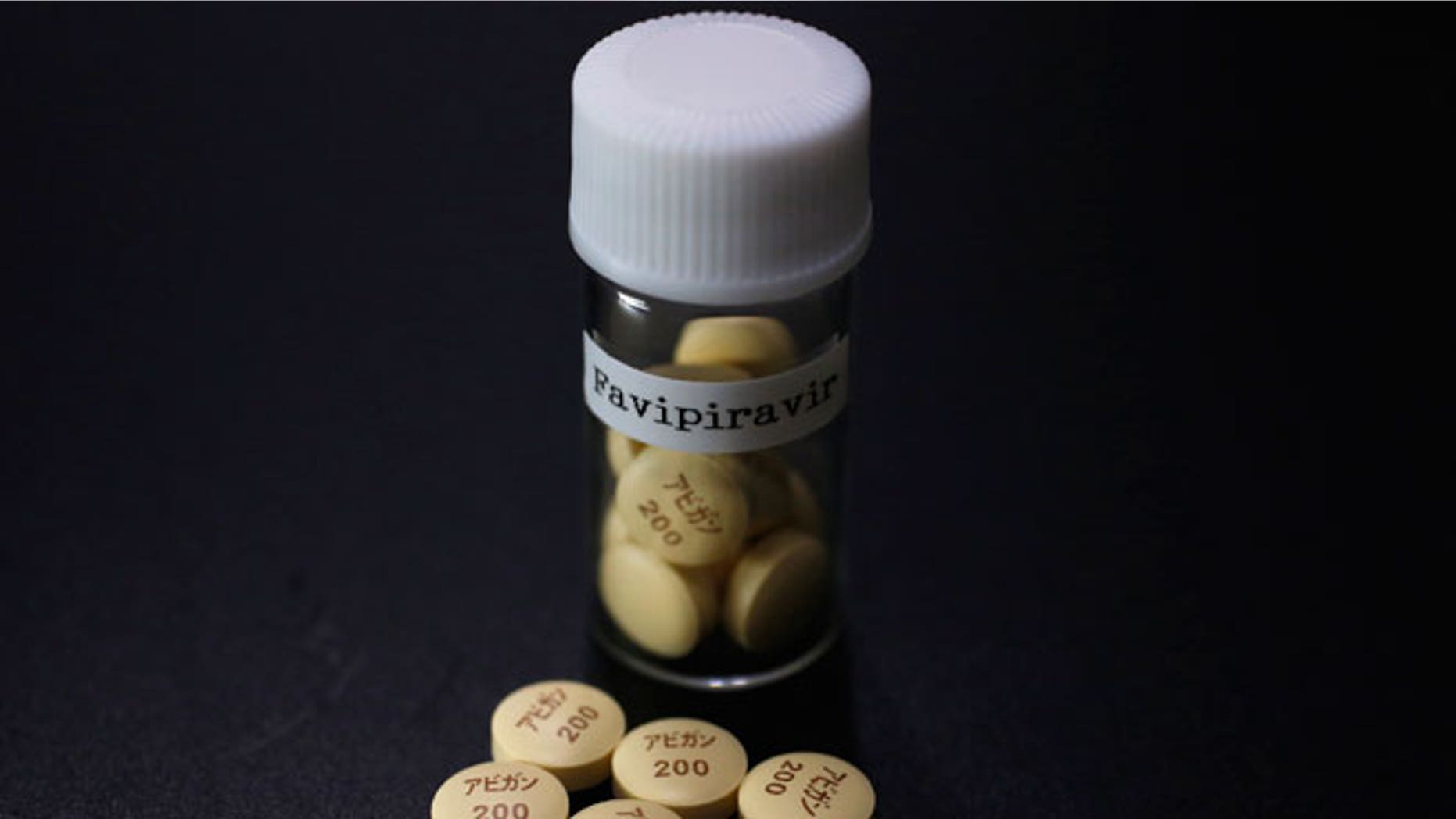 Tablets of Avigan (generic name : Favipiravir), a drug approved as an anti-influenza drug in Japan and developed by drug maker Toyama Chemical Co, a subsidiary of Fujifilm Holdings Co. are displayed during a photo opportunity at Fujifilm's headquarters in Tokyo October 22, 2014. Japan's Fujifilm Holdings Corp said on Monday it was expanding the production of its Avigan anti-influenza drug to reach an additional number of Ebola patients. France and Guinea plan to conduct clinical trials of Avigan 200 mg tablets, made by Fujifilm group company Toyama Chemical Co, in Guinea to treat Ebola in mid-November, Fujifilm said in a statement.