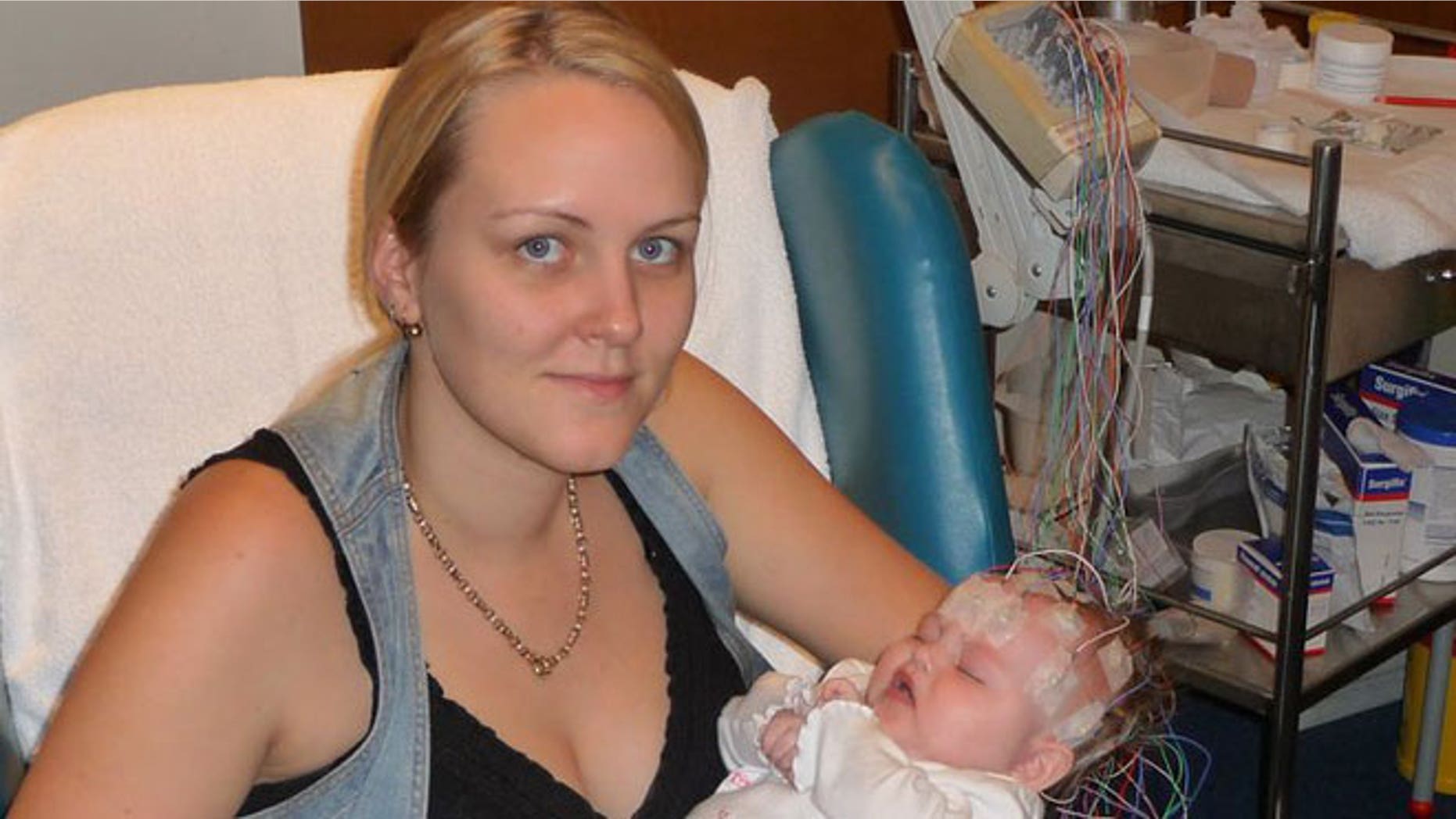 Mel Hammel holds her daughter, Chelsea, 4, who was diagnosed with the rare genetic disorder Aicardi syndrome at 11 months old.
