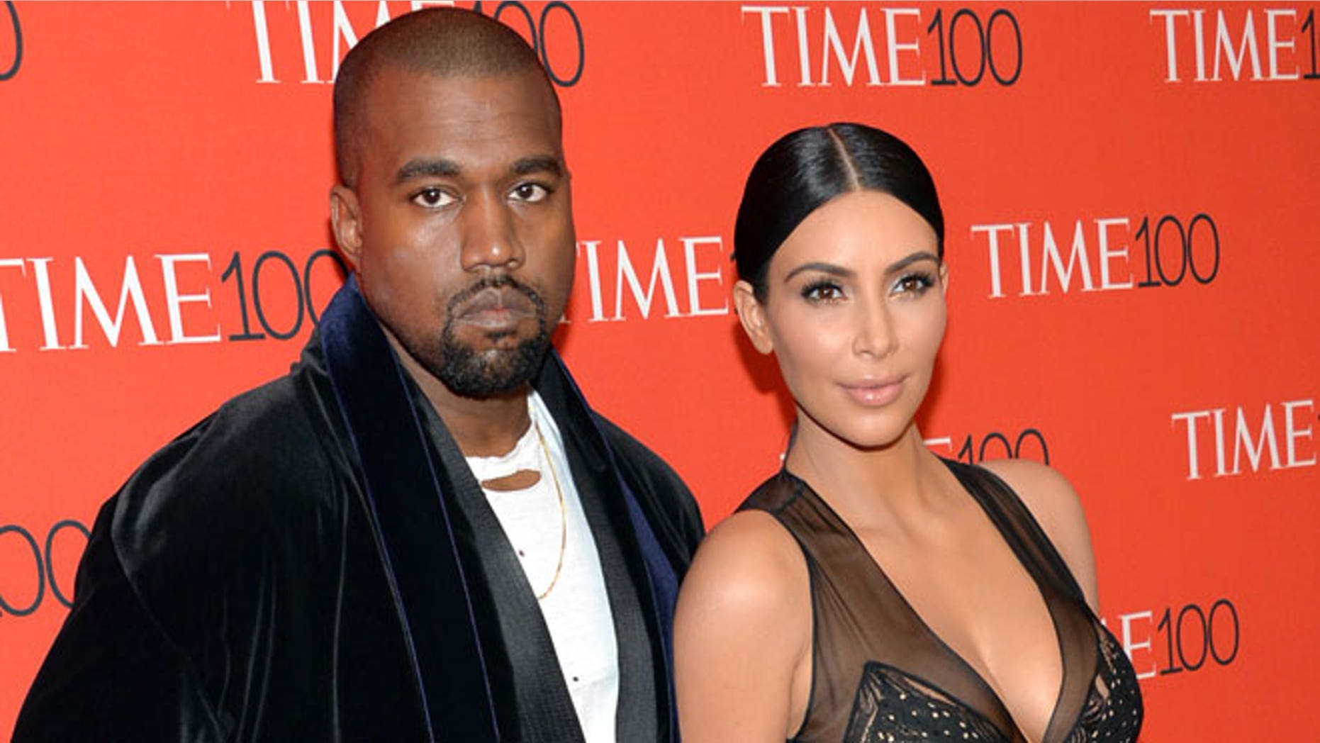 In this April 21, 2015 file photo, Kanye West, left, and Kim Kardashian attend the TIME 100 Gala, in New York. Kardashian and West are expecting a baby boy, the reality TV star's spokesperson confirmed Monday, June 22, 2015.