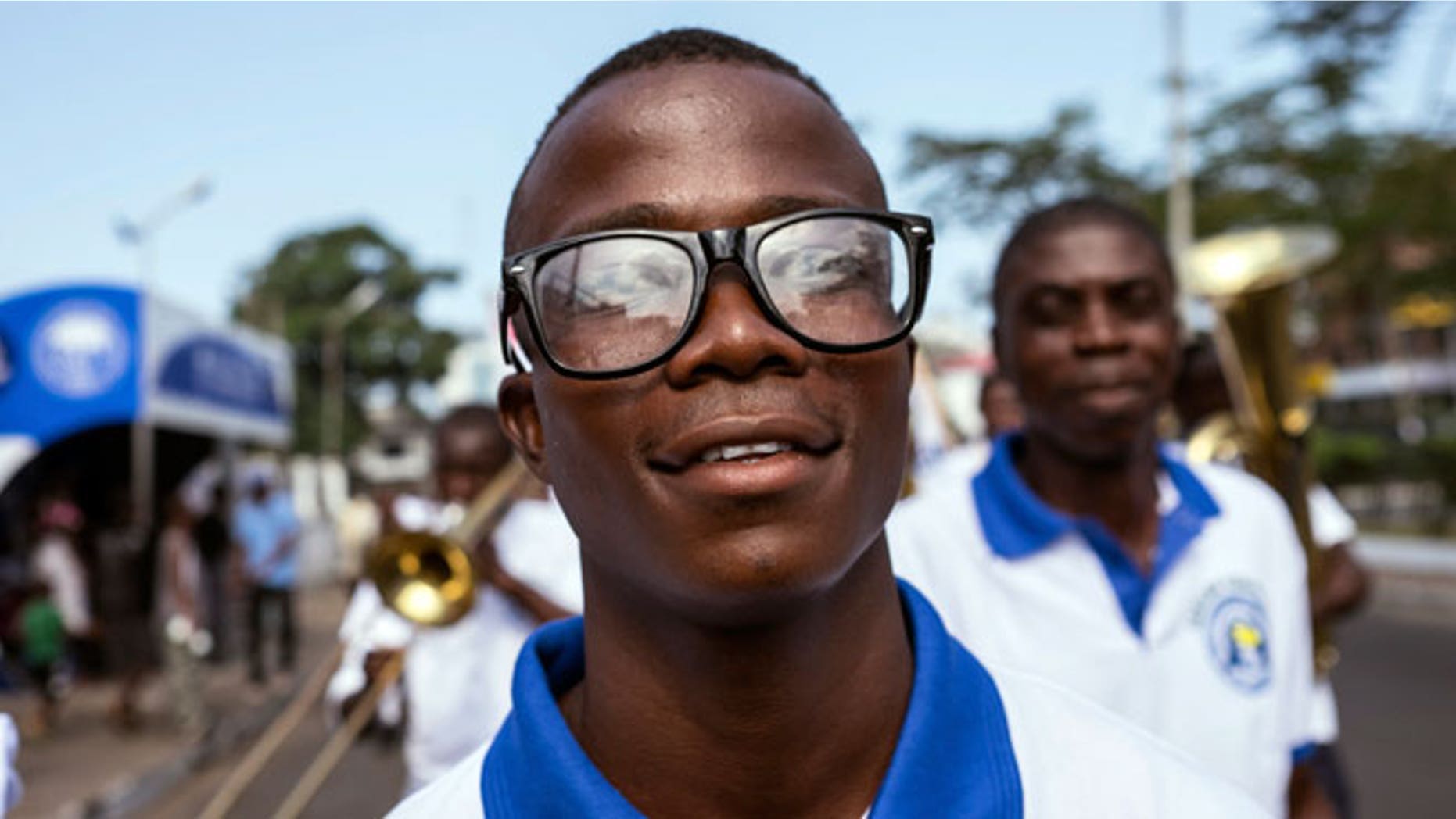 Ebola survivor Musa Pabai walks in an Ebola Survivors Valentine's Day parade in Monrovia, February 14, 2015.