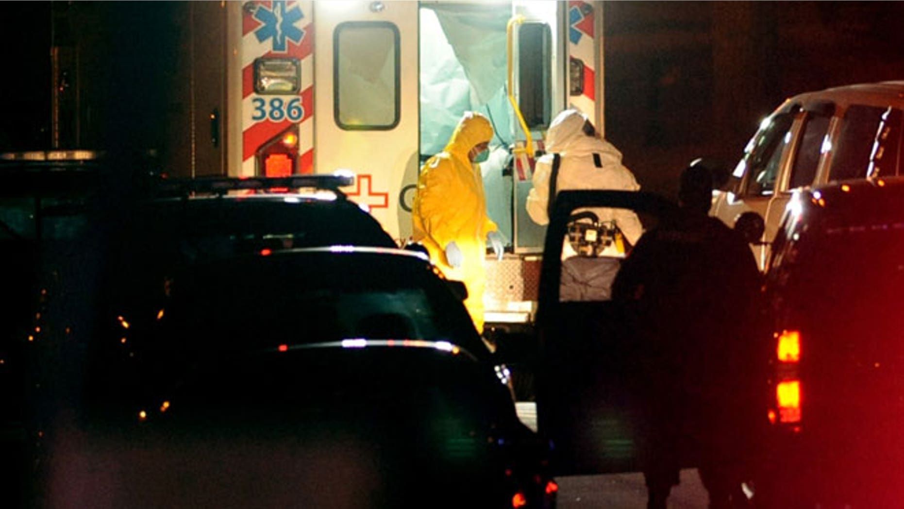 Texas nurse Amber Vinson (L) steps from an ambulance at Emory University Hospital in Atlanta, Georgia October 15, 2014. Vinson, the second Texas nurse who had contracted Ebola was flown to Emory Wednesday after being transferred from Texas Presbyterian Hospital. She had treated Liberian patient Thomas Eric Duncan, who died of Ebola and was the first patient diagnosed with the virus in the United States.