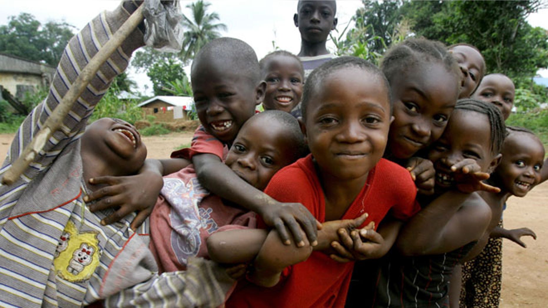 Sierra Leonian kids pose in Kailahun, about 19kms (12 miles) away from the Liberian border in Sierra Leone July 21, 2005.
