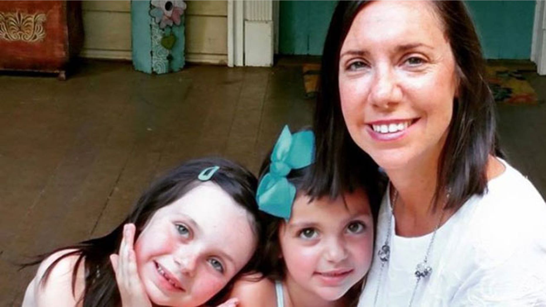Stephanie Ballard is pictured with her two daughters, Riley, 6, and Reese, 4.