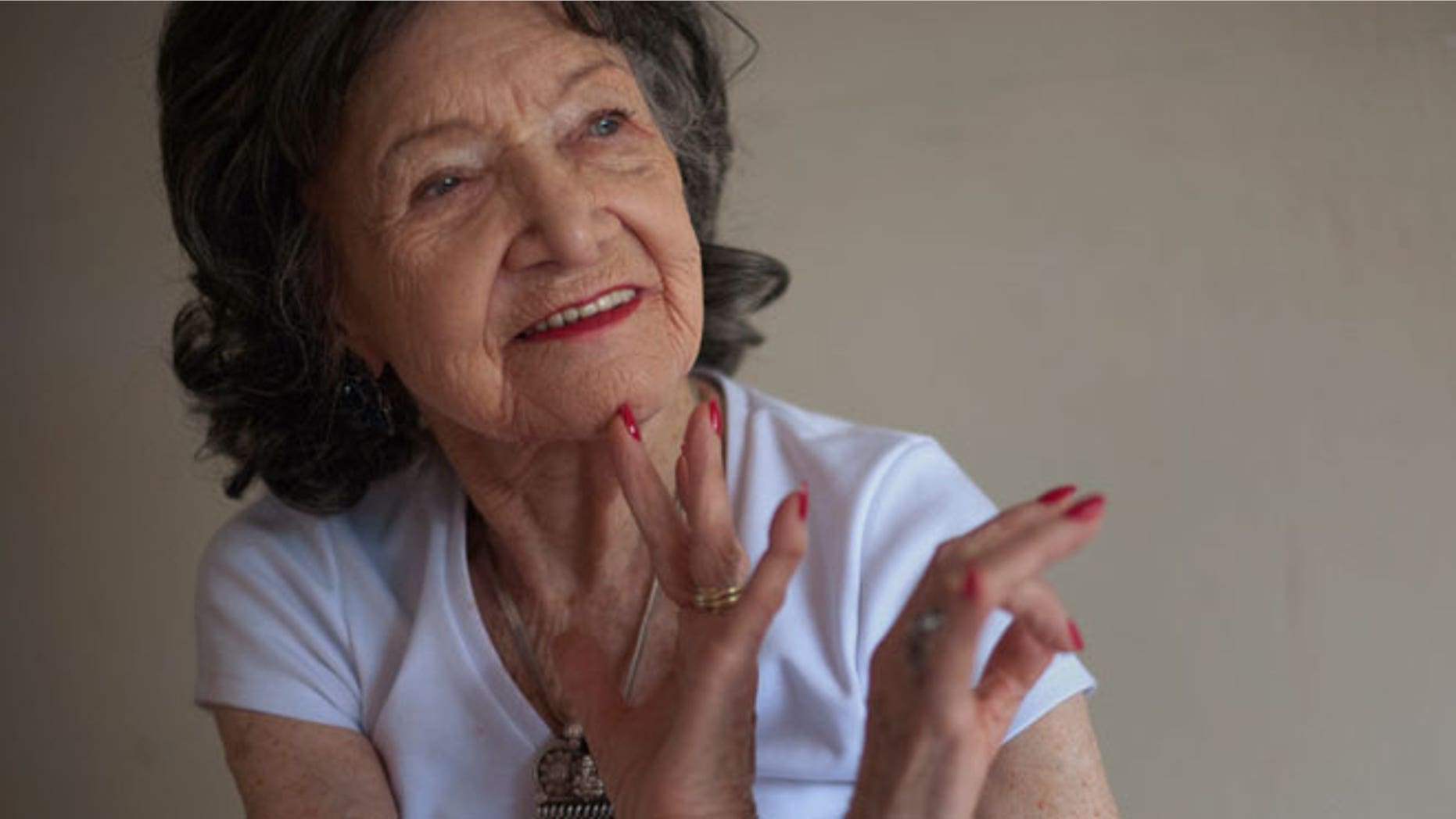 Yoga instructor Tao Porchon-Lynch goes through yoga poses at her yoga class in Hartsdale, New York May 14, 2012. At 93 years old, Porchon-Lynch was named the world's oldest yoga teacher by Guinness World Records.
