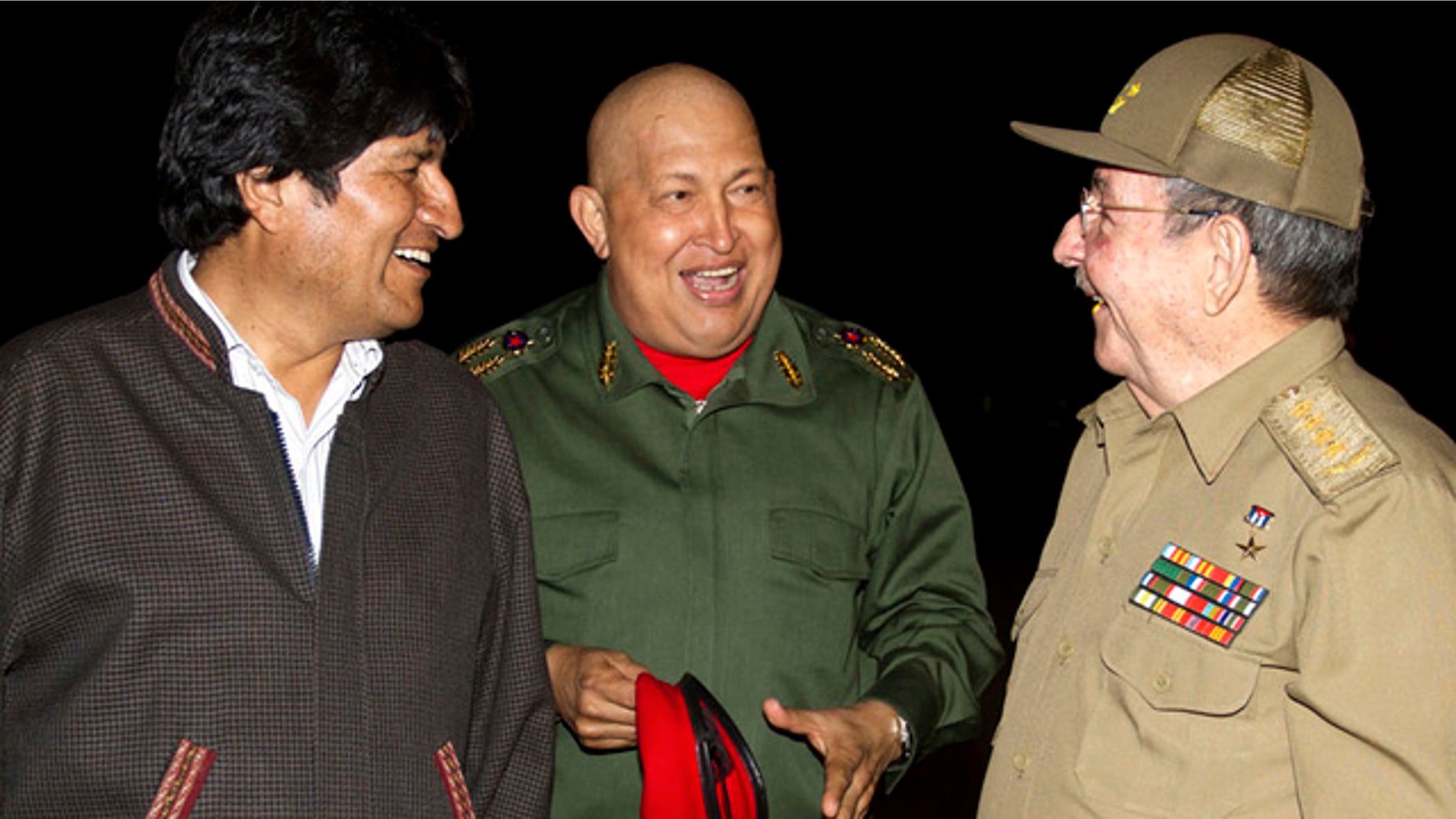 Sept. 18: In this picture released by the Agencia Boliviana de Informacion, Latin America leaders, from left, Bolivia's President Evo Morales, Hugo Chavez and Cuba's President Raul Castro speak at the Jose Marti airport in Havana, Cuba.