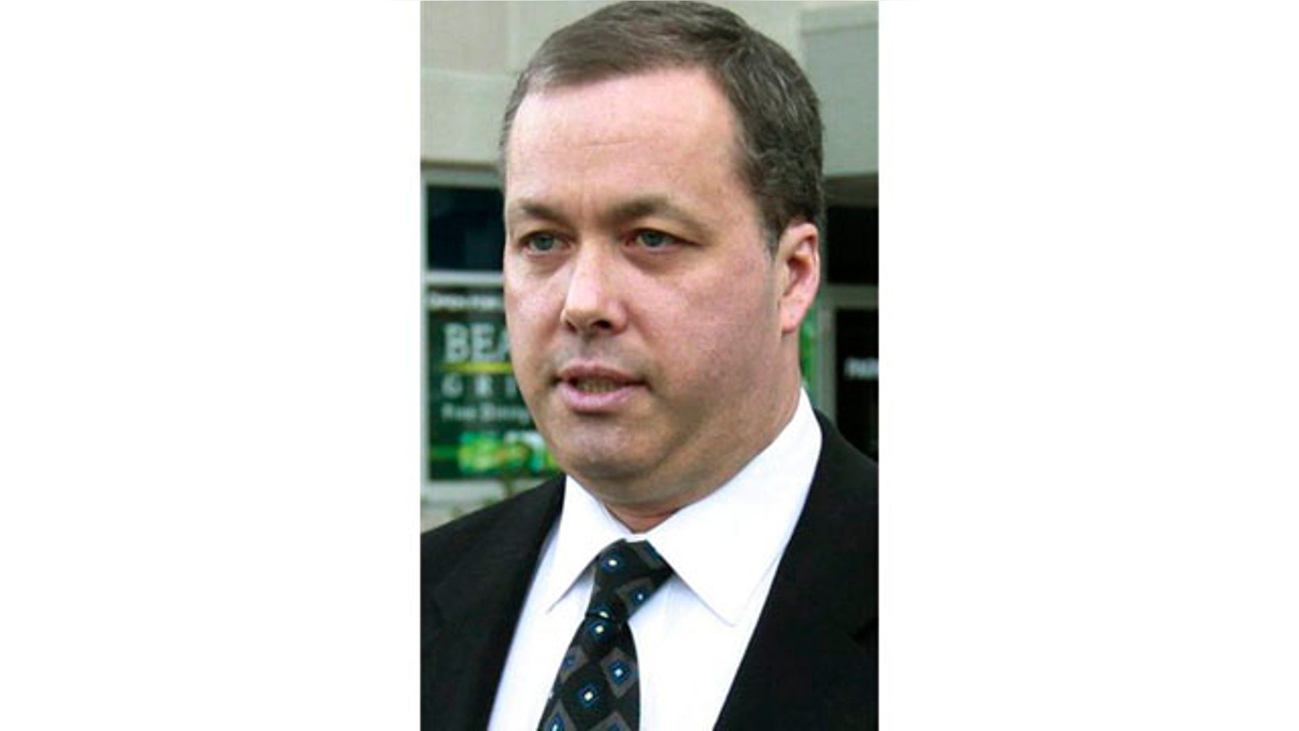 Nov. 18, 2010: Mark Kerrigan departs Middlesex Superior Court in Woburn, Mass.