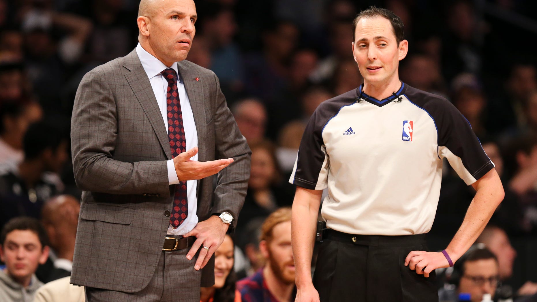 Brooklyn Nets head coach Jason Kidd, left, argues with referee Marat Kogut in the second half of an NBA basketball game against the Los Angeles Lakers at the Barclays Center, Wednesday, Nov. 27, 2013, in New York. The Lakers defeated the Nets 99-94. (AP Photo/John Minchillo)