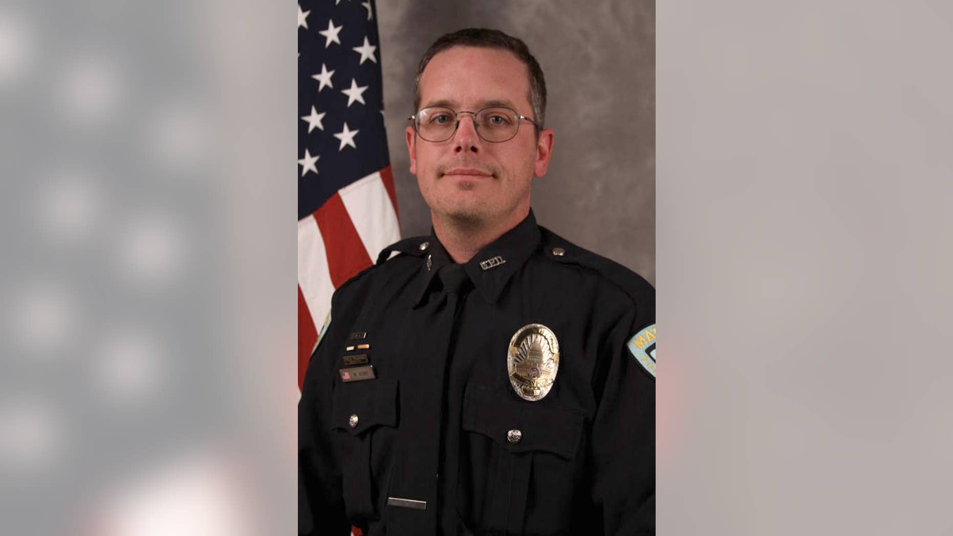 FILE - This undated file photo provided by the Madison, Wis., Police Department shows Officer Matt Kenny. Kenny, who won't face criminal charges in the fatal shooting of an unarmed 19-year-old man in Madison on March 6, 2015, wants to return to his job, but the police chief fears for his safety. (AP Photo/Madison Police Department, File)