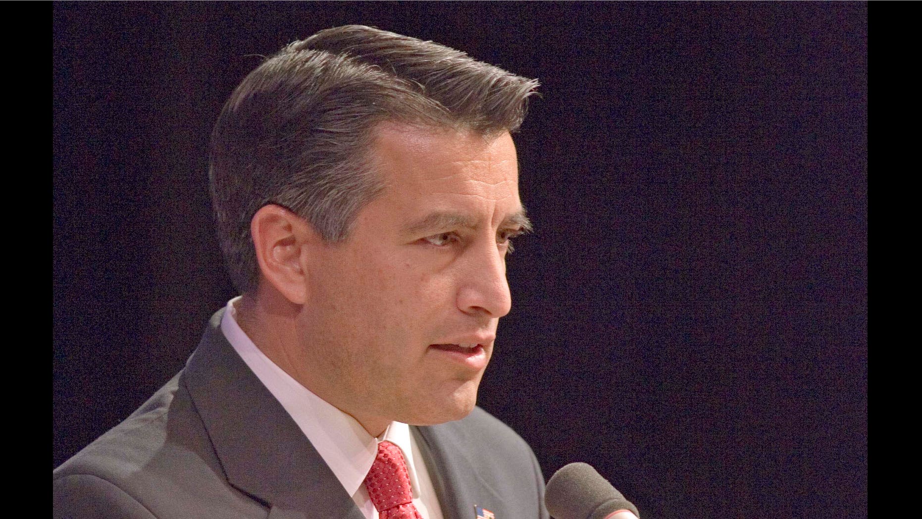 Gubernatorial candidate Brian Sandoval talks about Nevada issues during a debate with opponent Rory Reid Tuesday night, Oct 26, 2010 at Great Basin College Theater in Elko, Nev. Insults were traded and reputations questioned in a feisty debate Tuesday between Nevada gubernatorial candidates over the state's budget crisis, political ambitions and job experience as early voting winds down and Election Day looms. (AP Photo/Elko Daily Free Press, Ross Andreson).