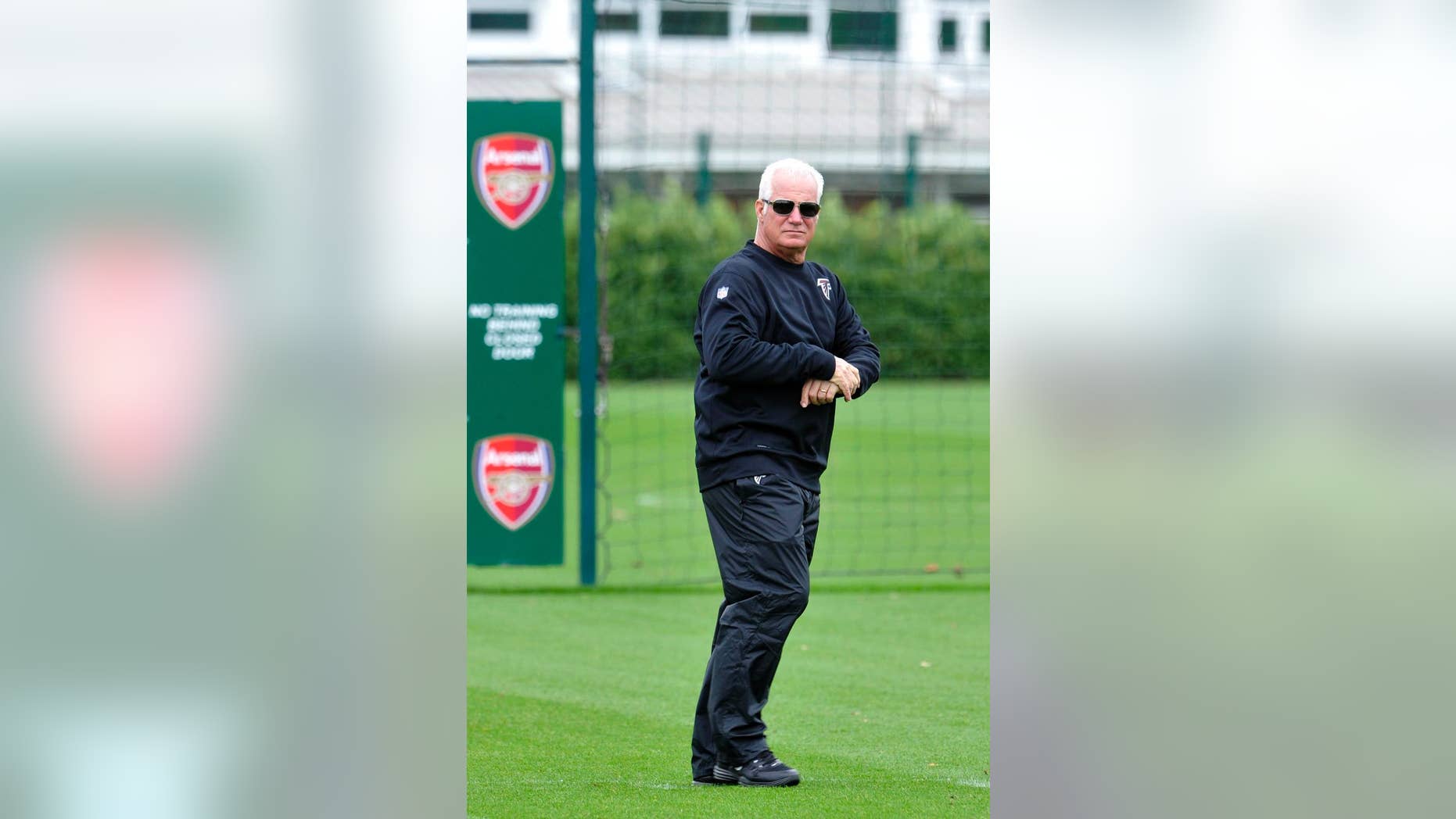 In this photo provided by the NFL, Atlanta Falcons head coach Mike Smith attends a team football practice session at London Colney, on the outskirts of London, Thursday, Oct. 23, 2014. The Atlanta Falcons will play the Detroit Lions in an NFL football game at London's Wembley Stadium on Sunday. (AP Photo/NFL, Sean Ryan)