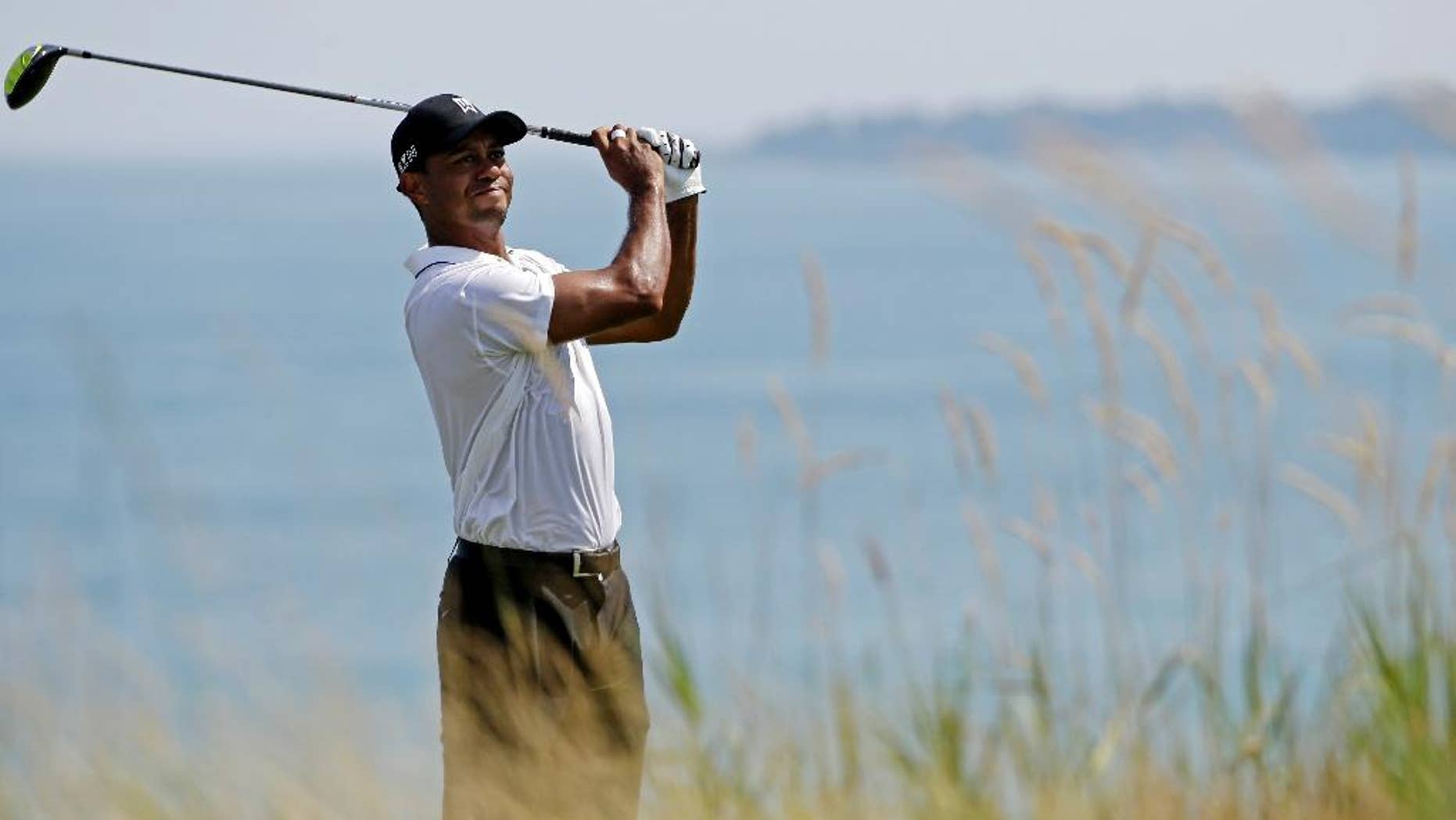 Tiger Woods hits on the fifth hole during the second round of the PGA Championship golf tournament Friday, Aug. 14, 2015, at Whistling Straits in Haven, Wis. (AP Photo/Brynn Anderson)