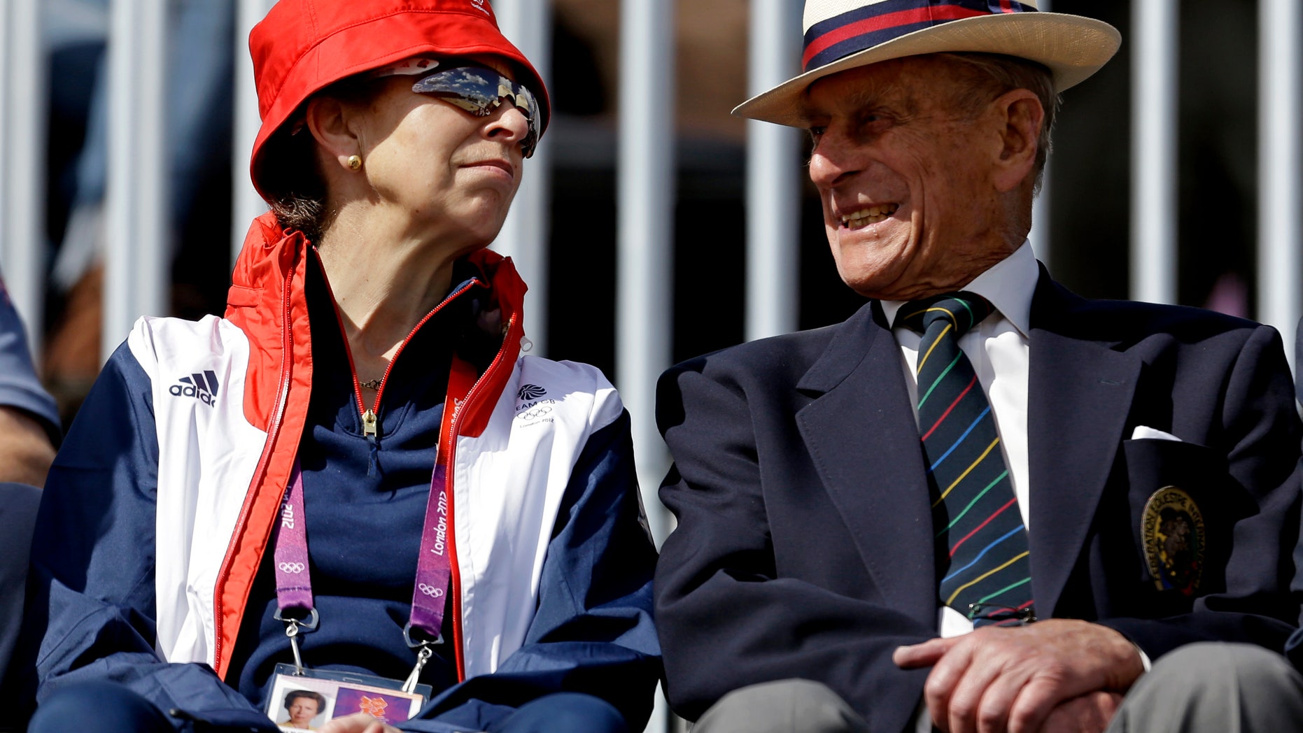 Princess Anne, left, mother of Great Britain equestrian rider Zara Phillips, attends the equestrian eventing dressage phase with Prince Phillip the Duke of Edinburgh, husband of Britain's Queen Elizabeth II, at the 2012 Summer Olympics, Sunday, July 29, 2012, in London. (AP Photo/David Goldman)