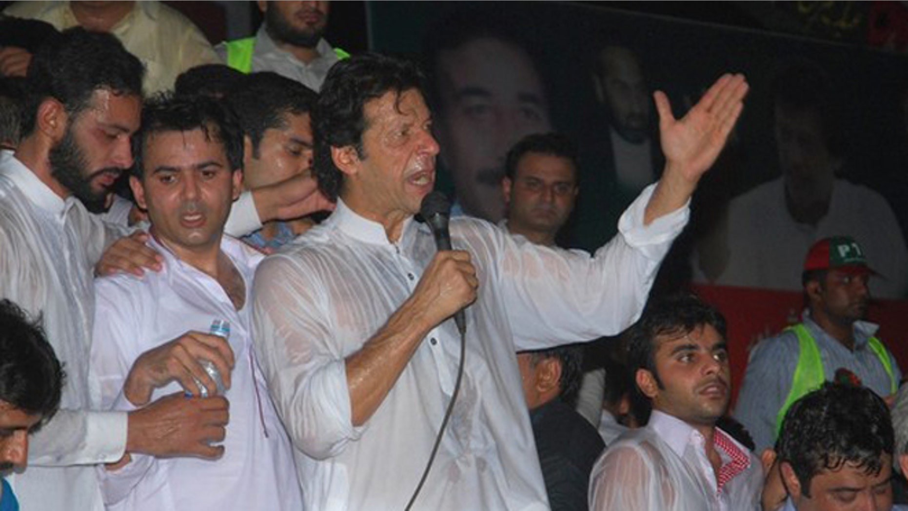 July 5, 2012: Pakistani former cricket star-turn-politician Imran Khan condemns the movement of NATO supplies to Afghanistan through Pakistan at a rally in Gujranwala near Lahore, Pakistan.