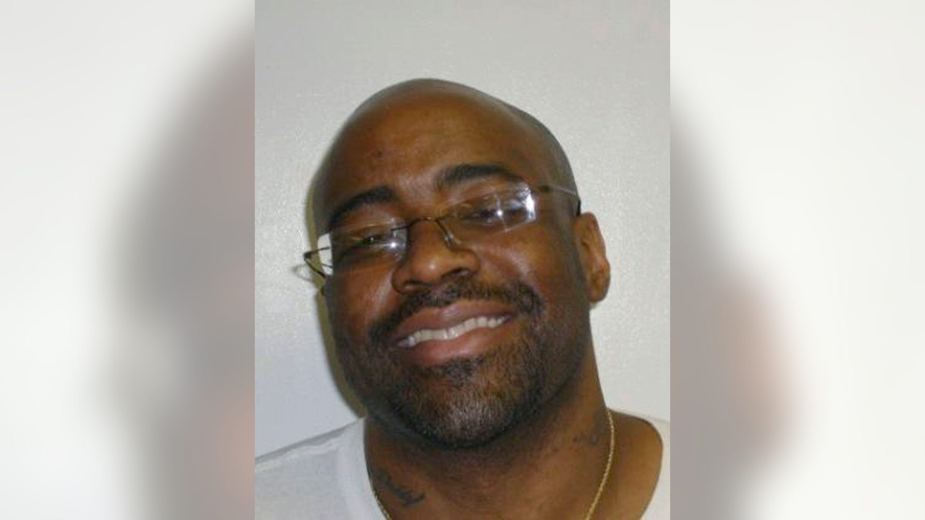 This June 29, 2011 photo provided by the Oklahoma Department of Corrections, shows Michael Lee Wilson. Convicted in the 1995 beating death of 30-year-old Richard Yost, Wilson is scheduled to be executed by lethal injection Jan. 9, 2014. Wilson was one of four men found guilty in the Feb. 26, 1995 murder. (AP Photo/Oklahoma Department of Corrections)