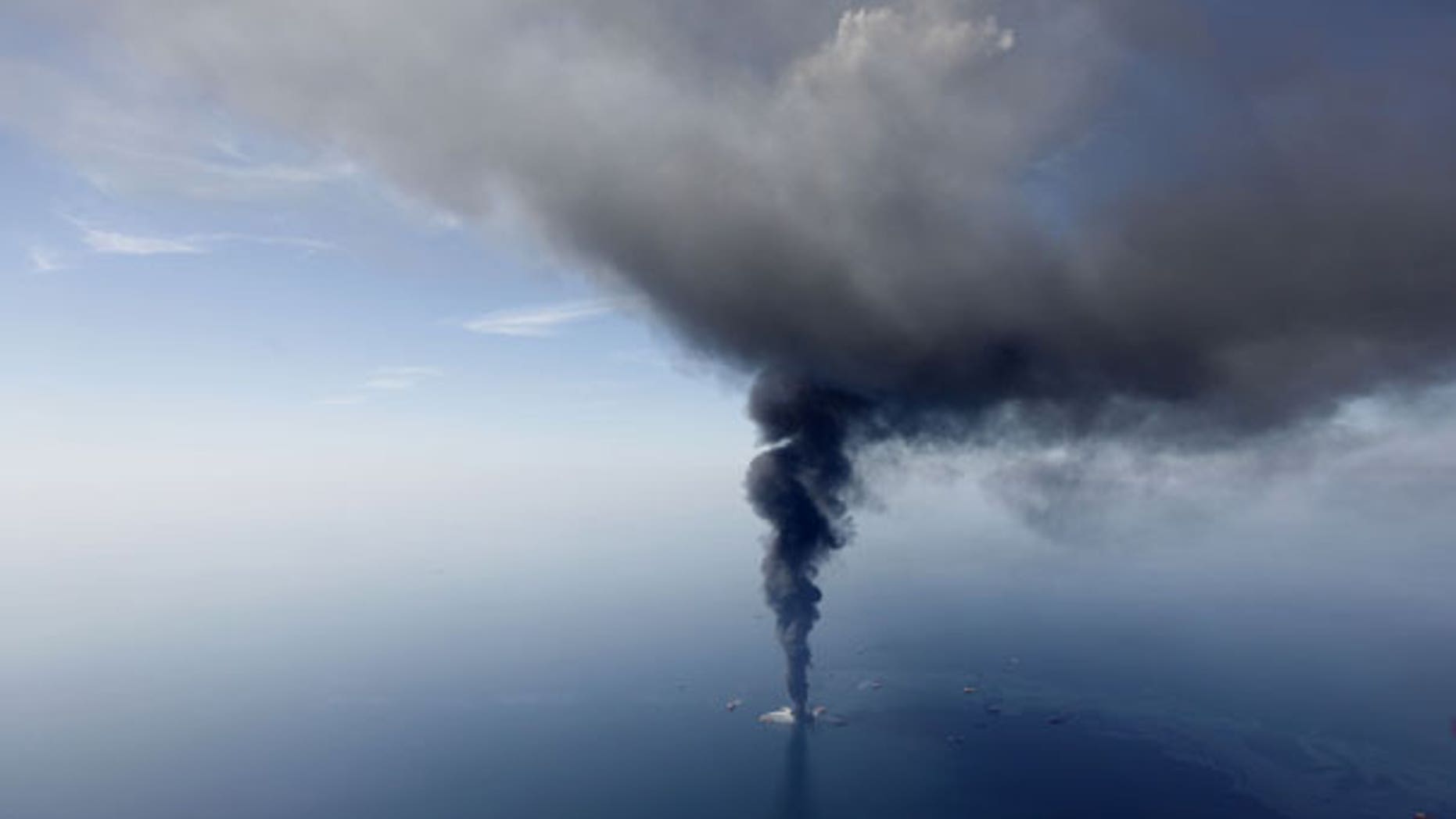 April 21: In this aerial photo taken in the Gulf of Mexico more than 50 miles southeast of Venice on Louisiana's tip, the Deepwater Horizon oil rig is seen burning. (AP)