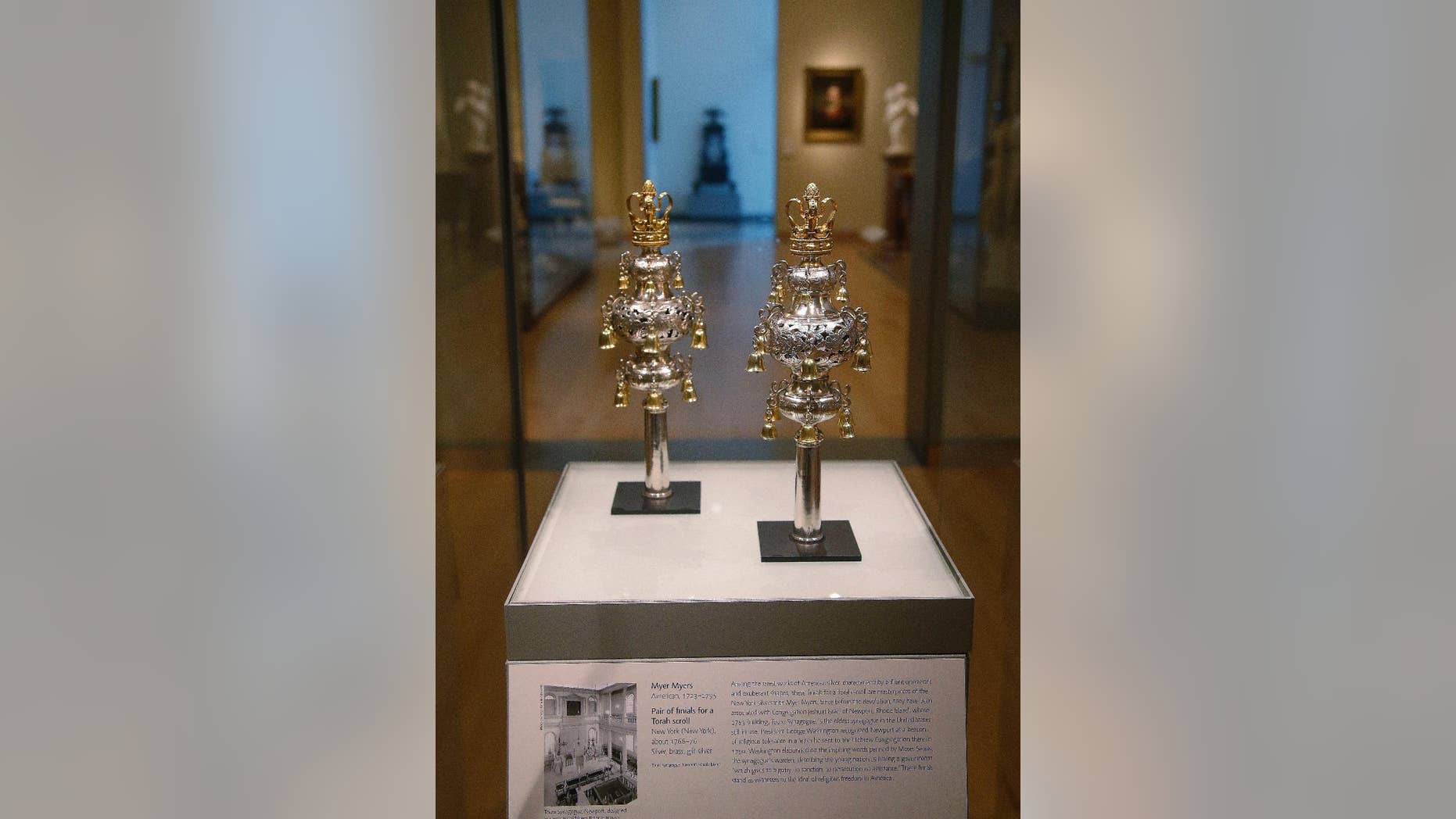 FILE - In this June 1, 2015, file photo, ceremonial bells belonging to the 250-year-old Touro Synagogue in Newport, R.I., and worth more than $7 million are on display at the Museum of Fine Arts in Boston. A federal judge overseeing a trial over control of the nation’s oldest synagogue and ceremonial bells said on Friday, Sept. 18, there is no “smoking gun,” in the battle between the congregation that worships at the 250-year-old Touro Synagogue in Newport and the nation's first Jewish congregation, in New York. (AP Photo/Stephan Savoia, File)