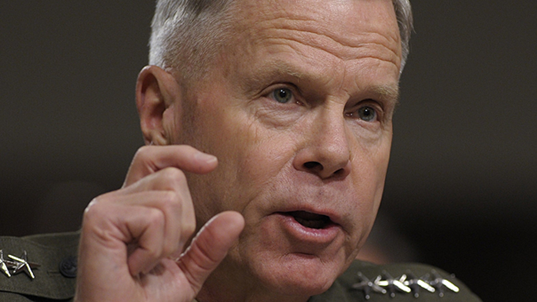 FILE: Gen. James Amos, assistant commandant of the U.S. Marine Corps, testifies on Capitol Hill in Washington on June 22, before the Senate Armed Services Committee hearing.